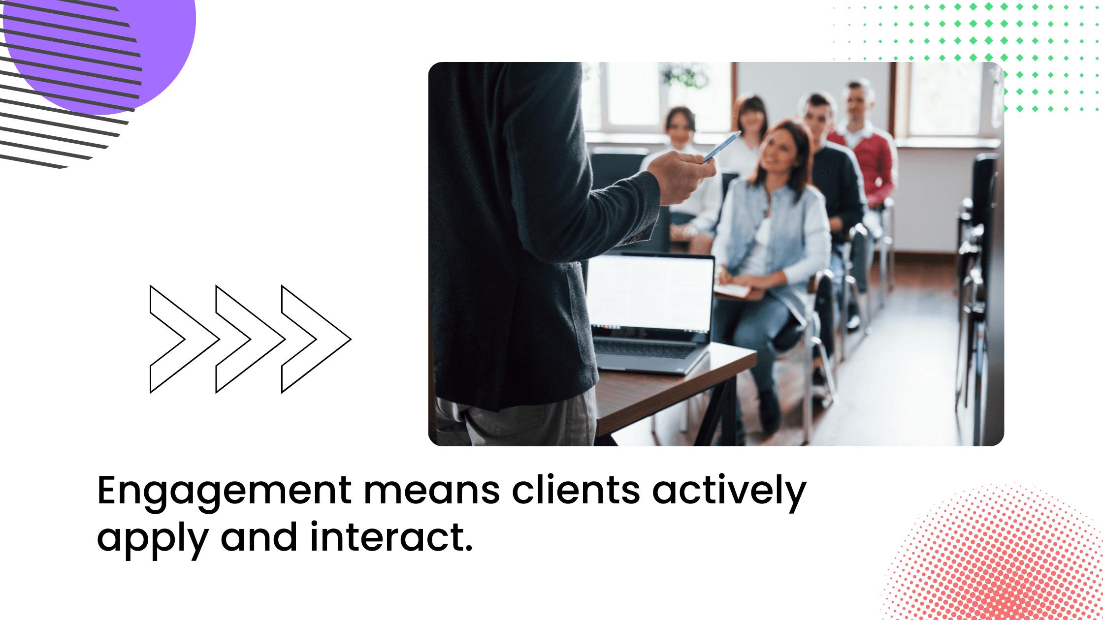 Coach presenting to seated clients in a workshop, showing active participation and engagement in a coaching program.