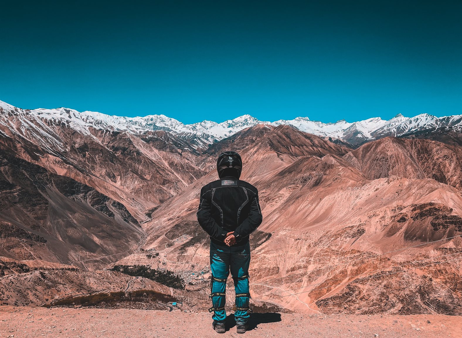 group of people setting up campfire