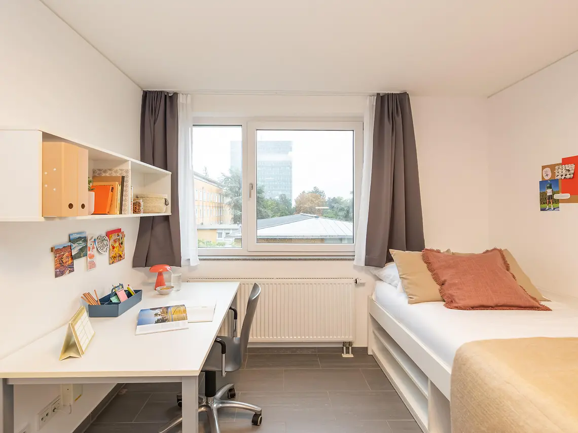 Student bedroom in Darmstadt with desk, bed and dedicated study space
