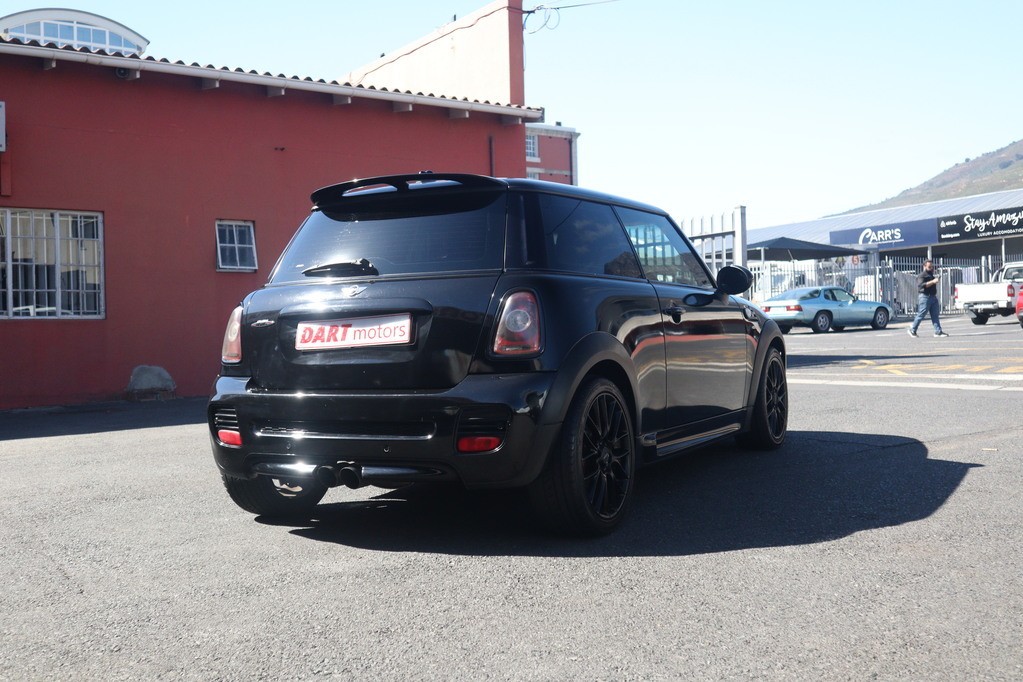 man in white crew neck shirt wearing black framed eyeglasses