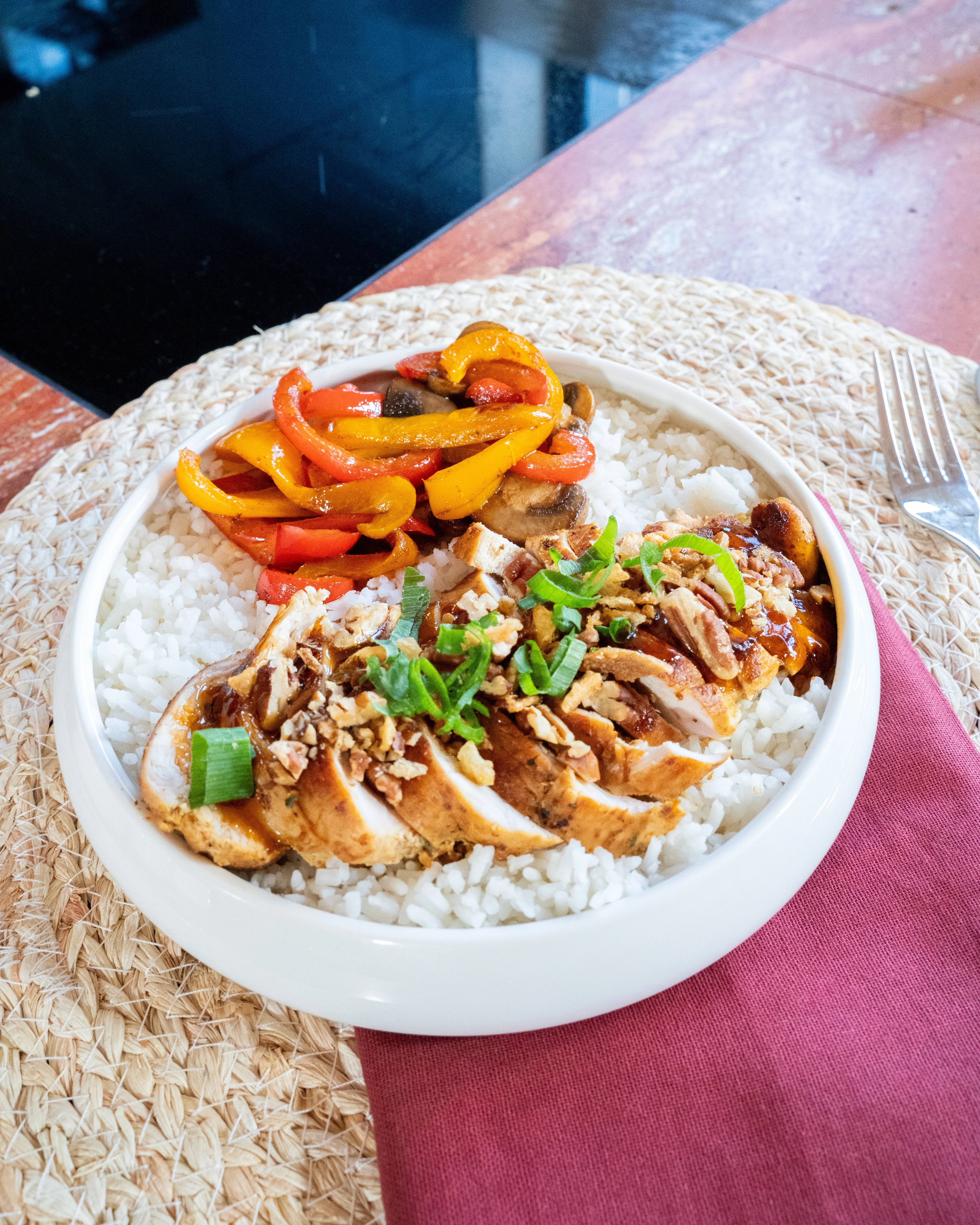 A plate filled with fresh hummus mixed with OYM olive oil