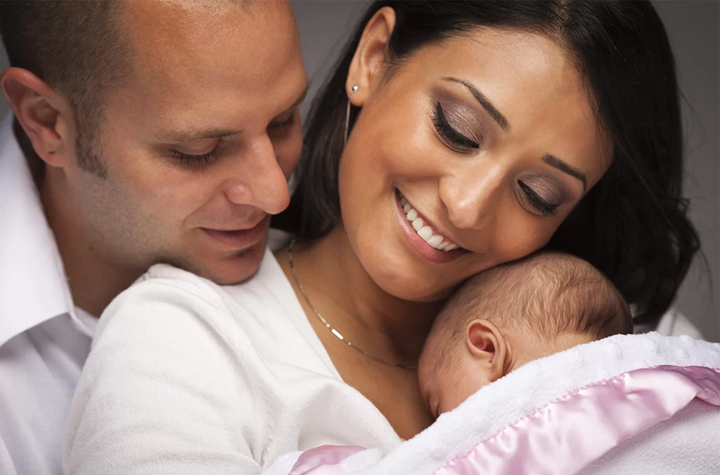 Heterosexual couple with baby