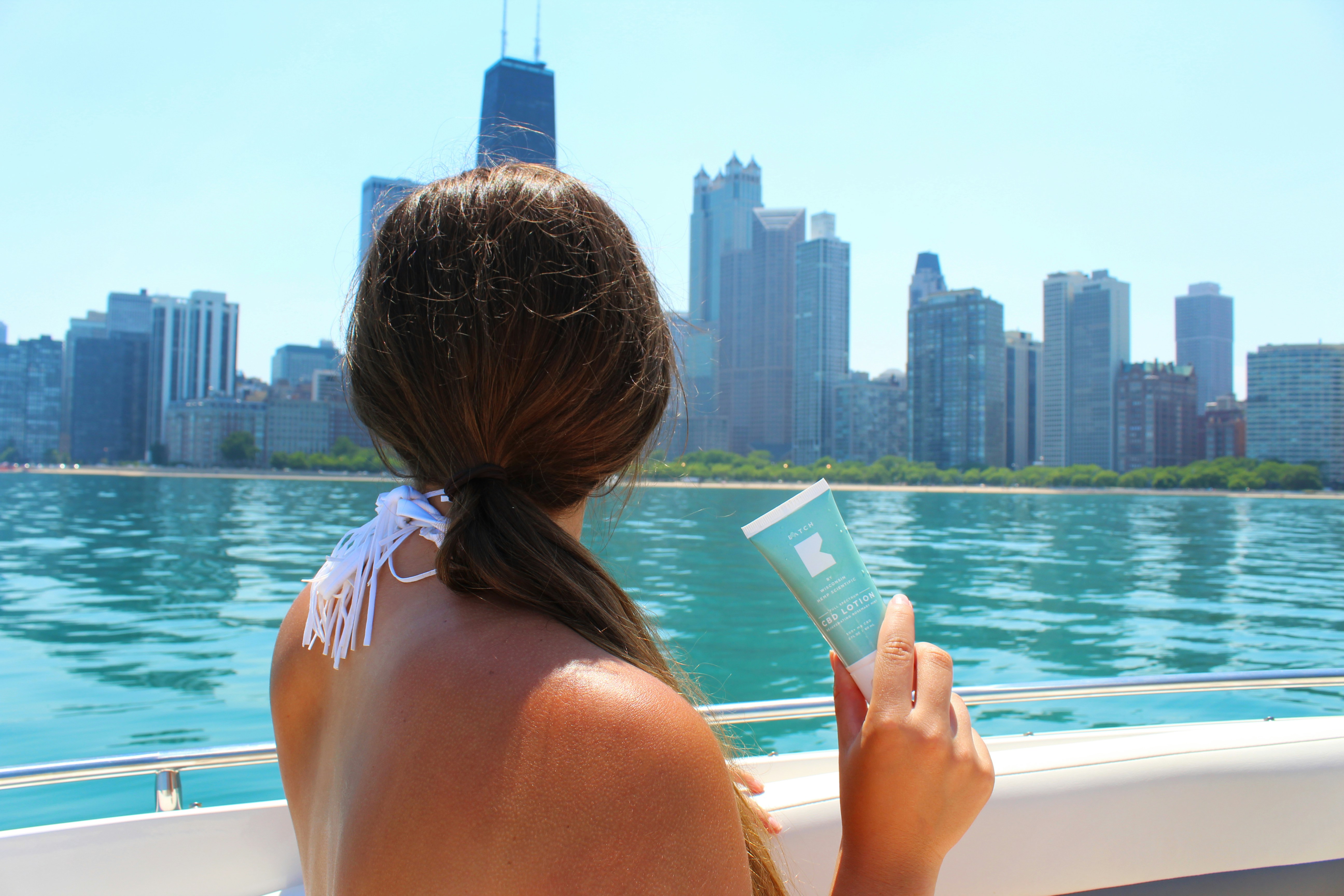 woman enjoying her europe trip - European Skincare Brands 