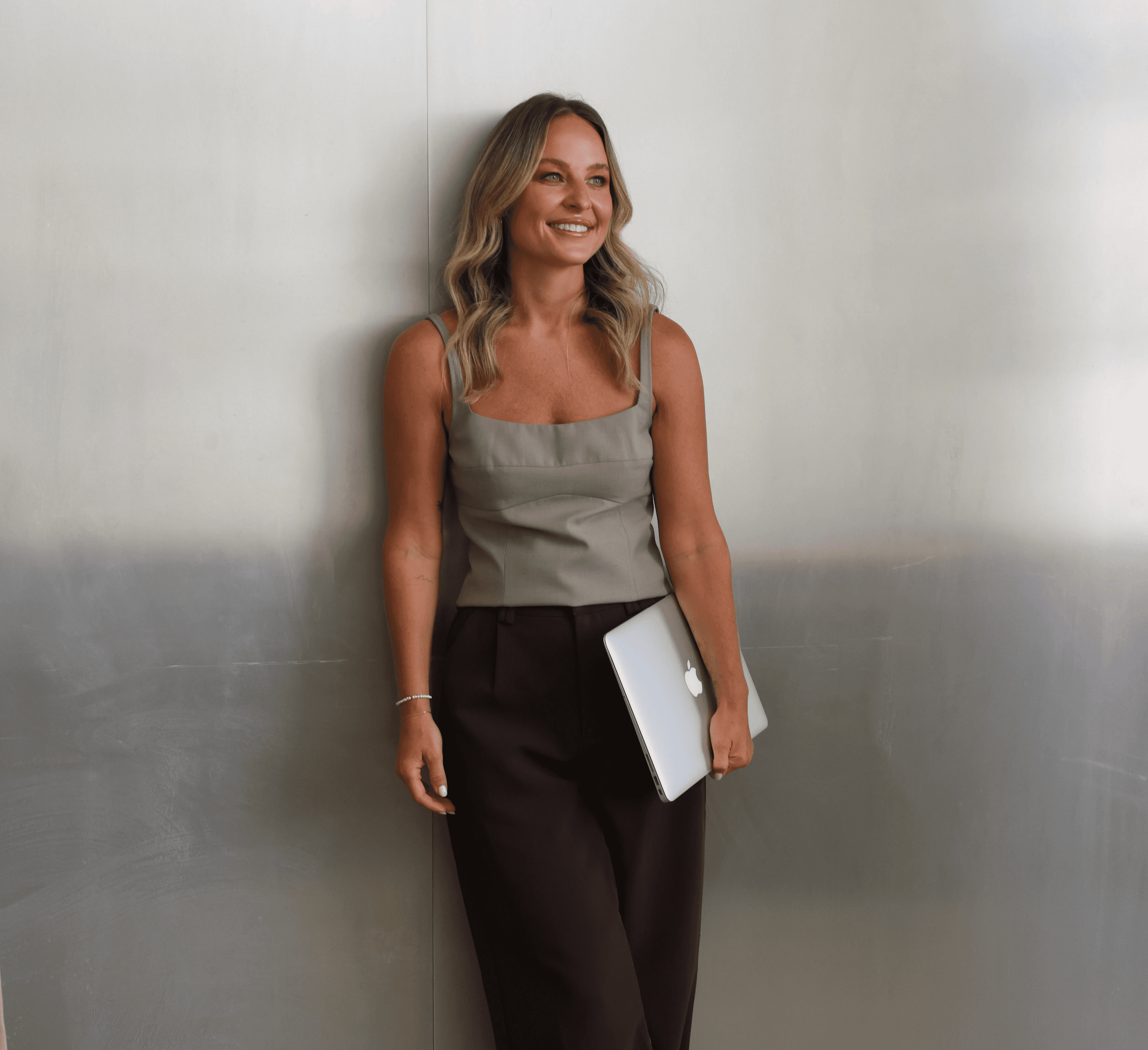 Streetside billboard with flyposters of the Batch.Works brand and illustrations