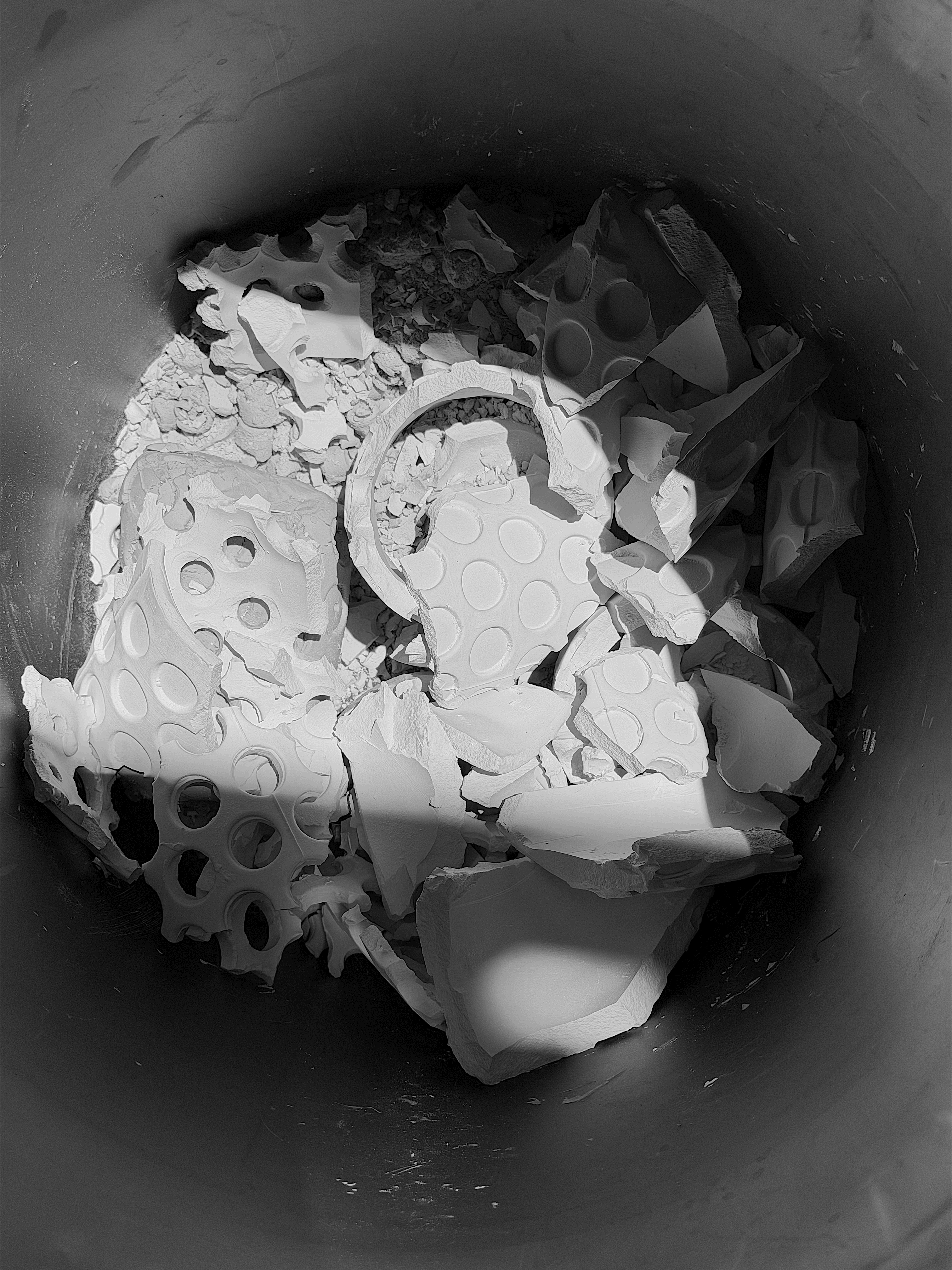 Batch.Works logo over a photo of a box of 3D printed objects