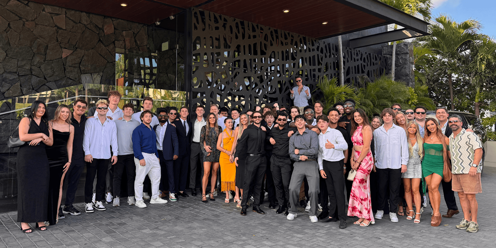 "Group of Flex Marketing team members celebrating success, showcasing a dynamic and diverse community of entrepreneurial professionals."