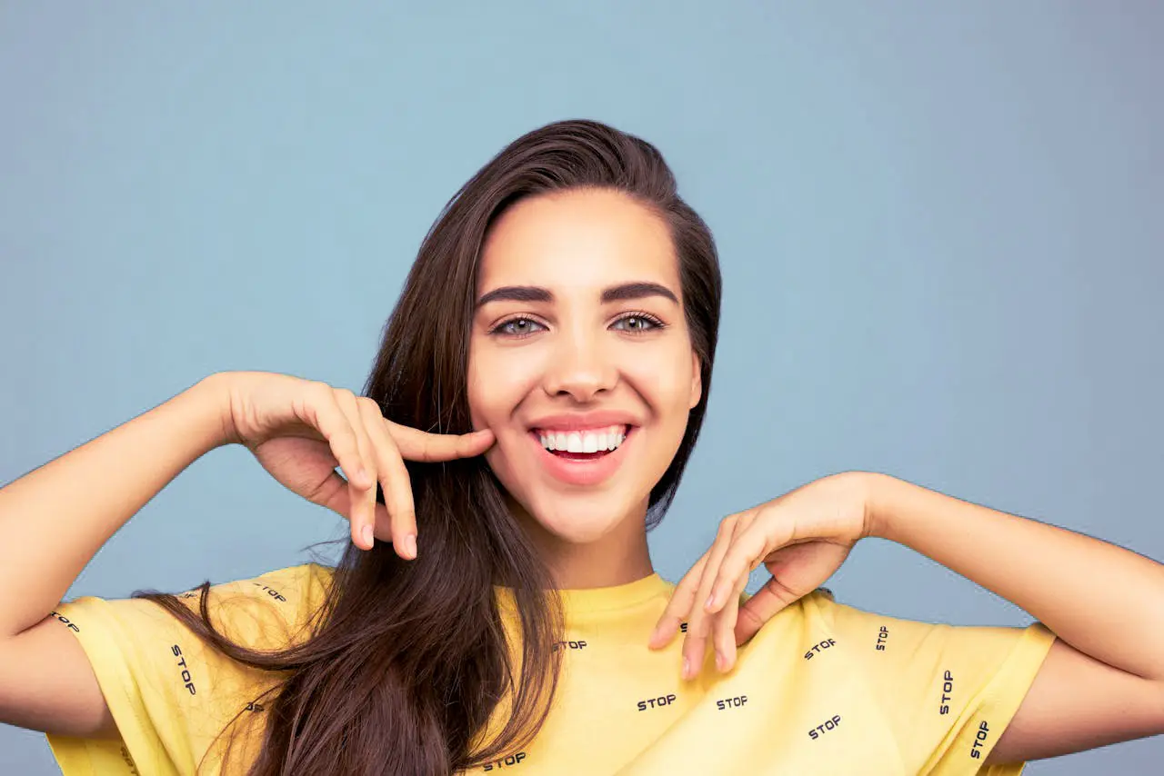 Young woman smiling.