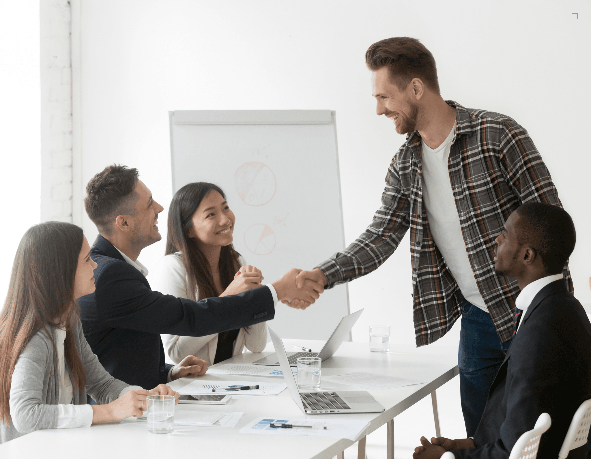 Interior of a cafe or workspace with several people at tables