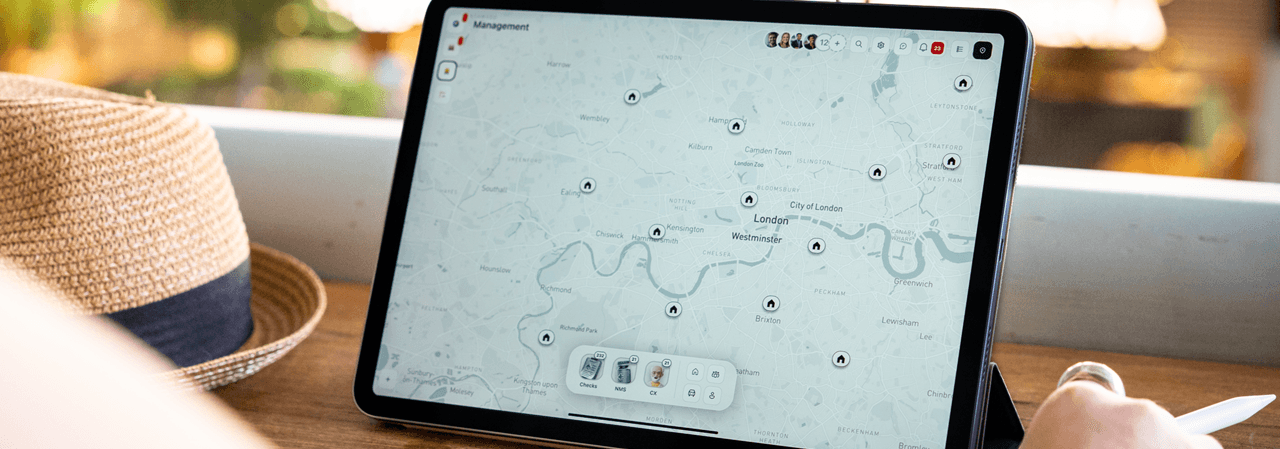 iPad displaying a map-based pharmacy management interface, symbolising Titanverse’s command centre for remote, multi-site pharmacy operations