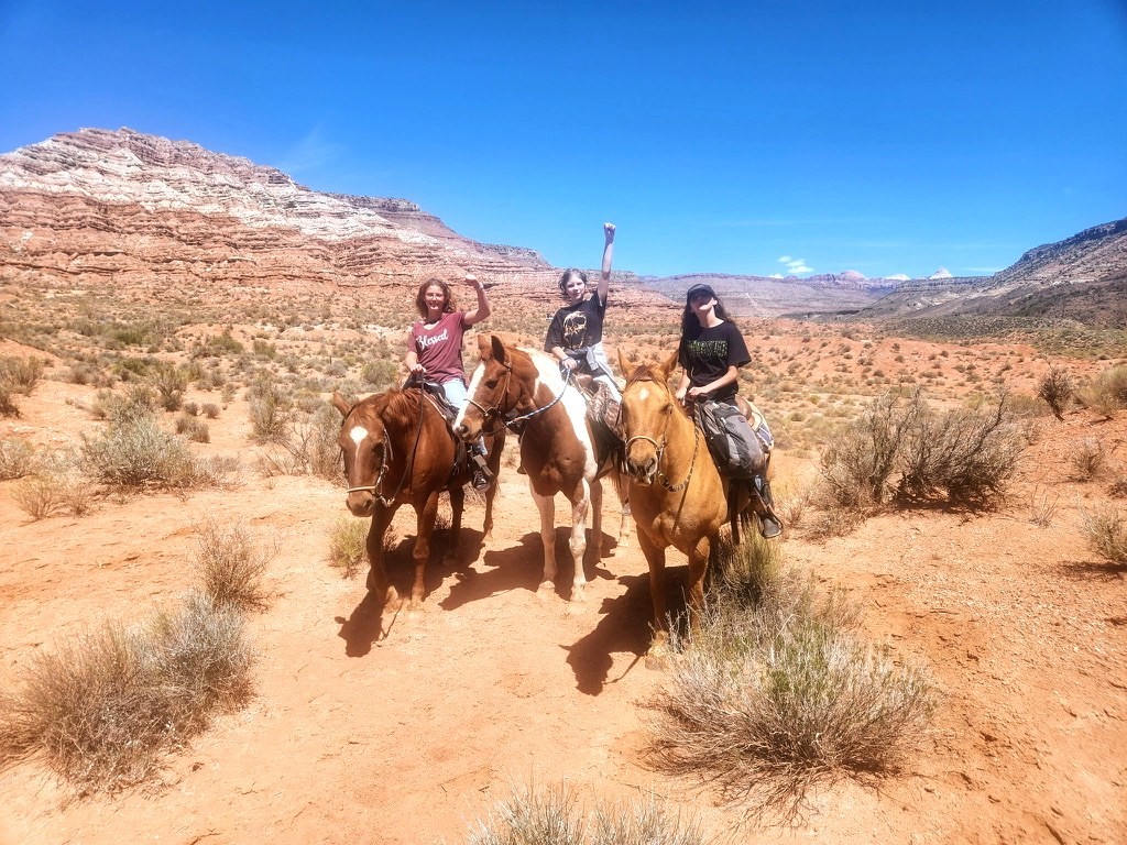 Homeschool horseback riding day on the red rock trails outside Virgin