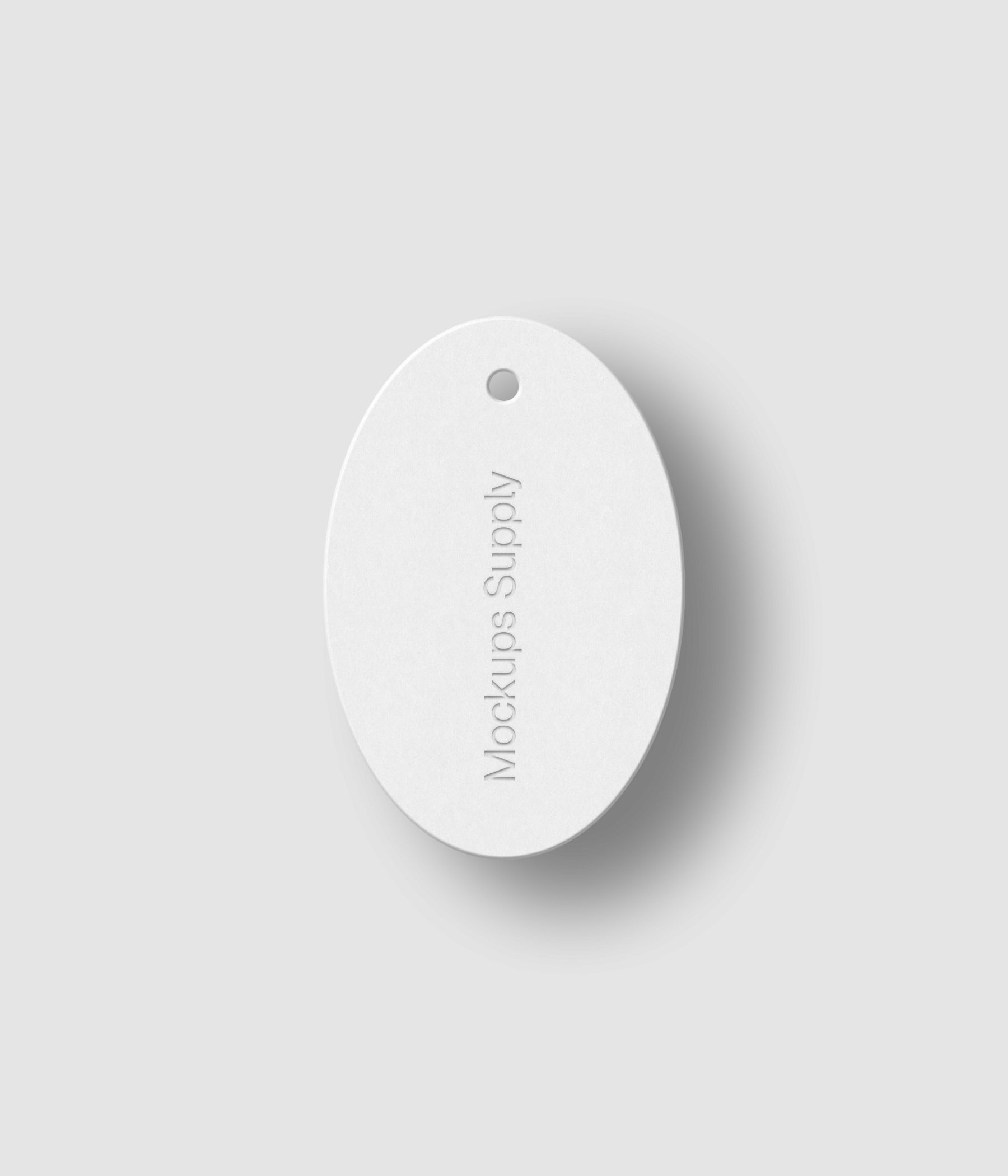 Oval white hang tag 2x3 ratio with debossed text effect and shadow on editable white background photoshop PSD mockup template