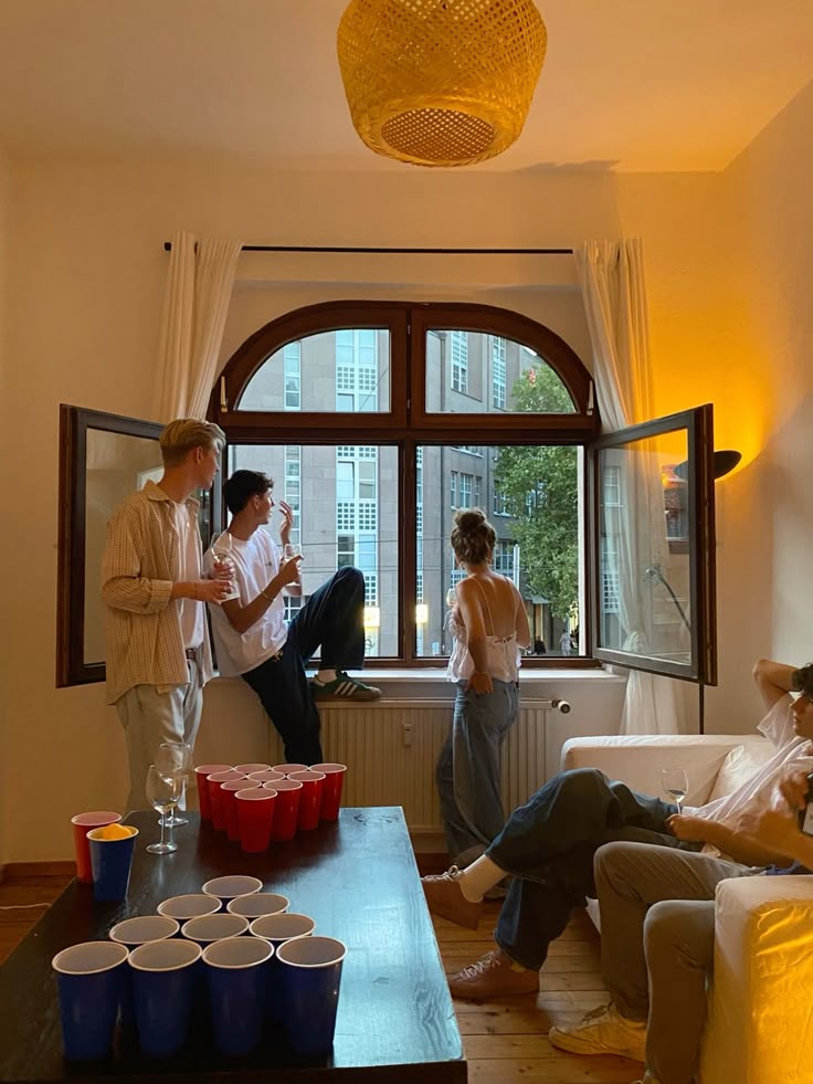 men sitting in front of their laptop computer