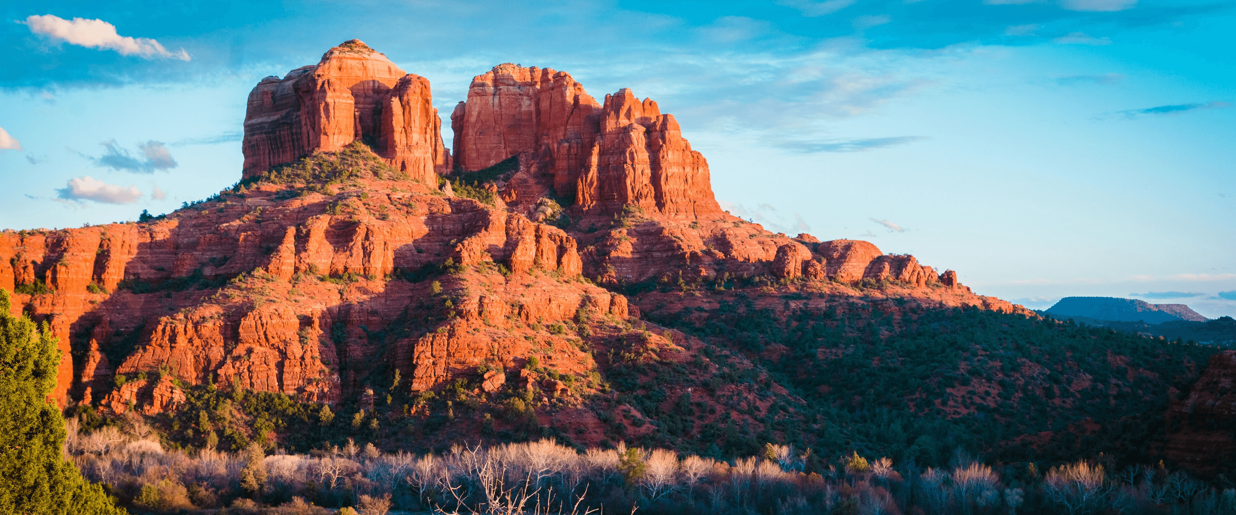 brown rocky mountain under blue sky during daytime