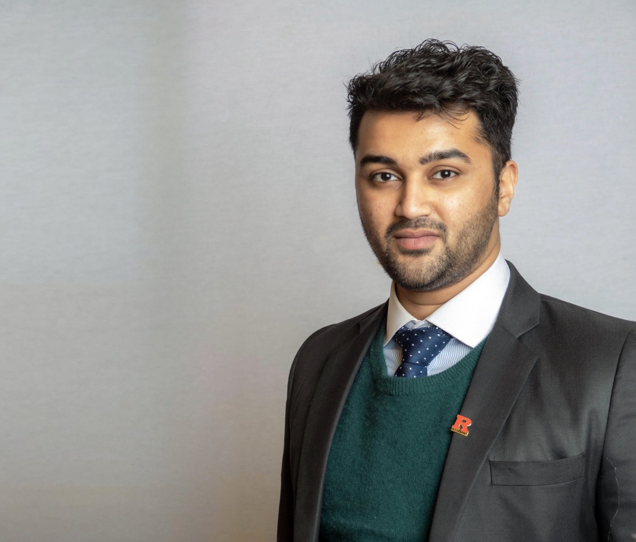 a tiger standing in the grass