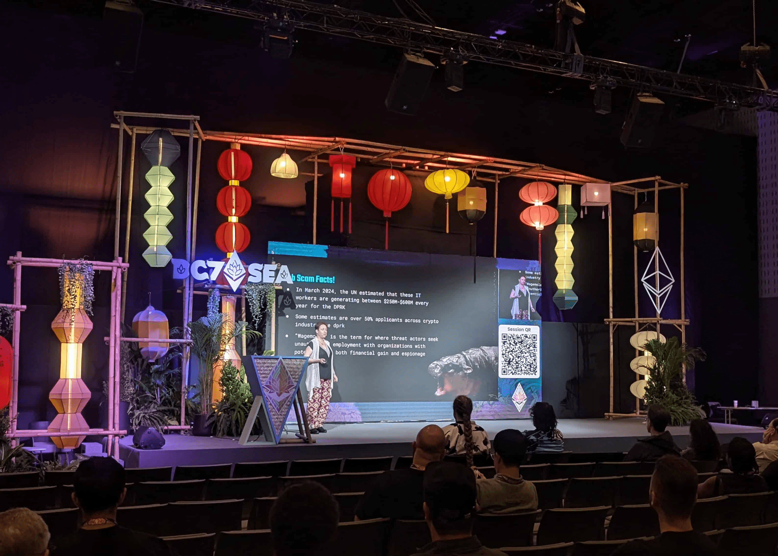 a speaker on stage at devcon7 SEA in 2024