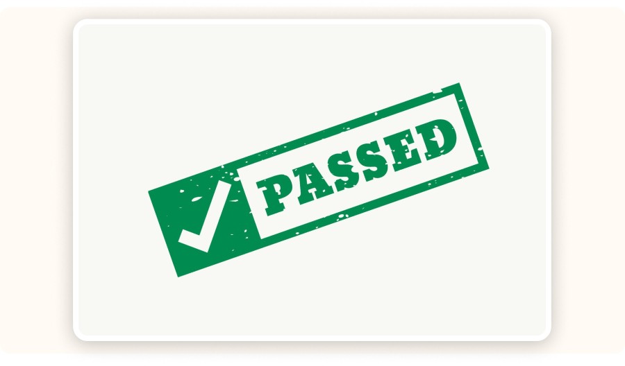 Green passed stamp with check mark indicating approval or success&nbsp;