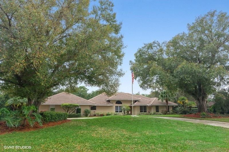2002 Roof Replacement in Reserve Plantation, PGA Village, Port St Lucie with Entegra Flat Tapershake Tile in Desert Tan