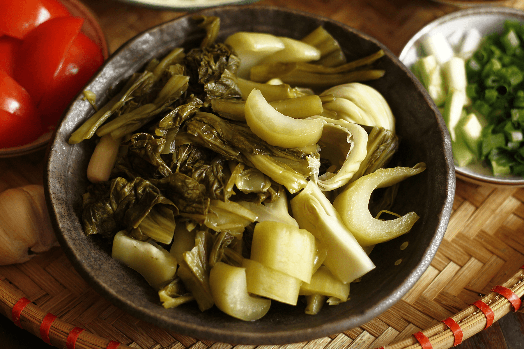 group of people setting up campfire