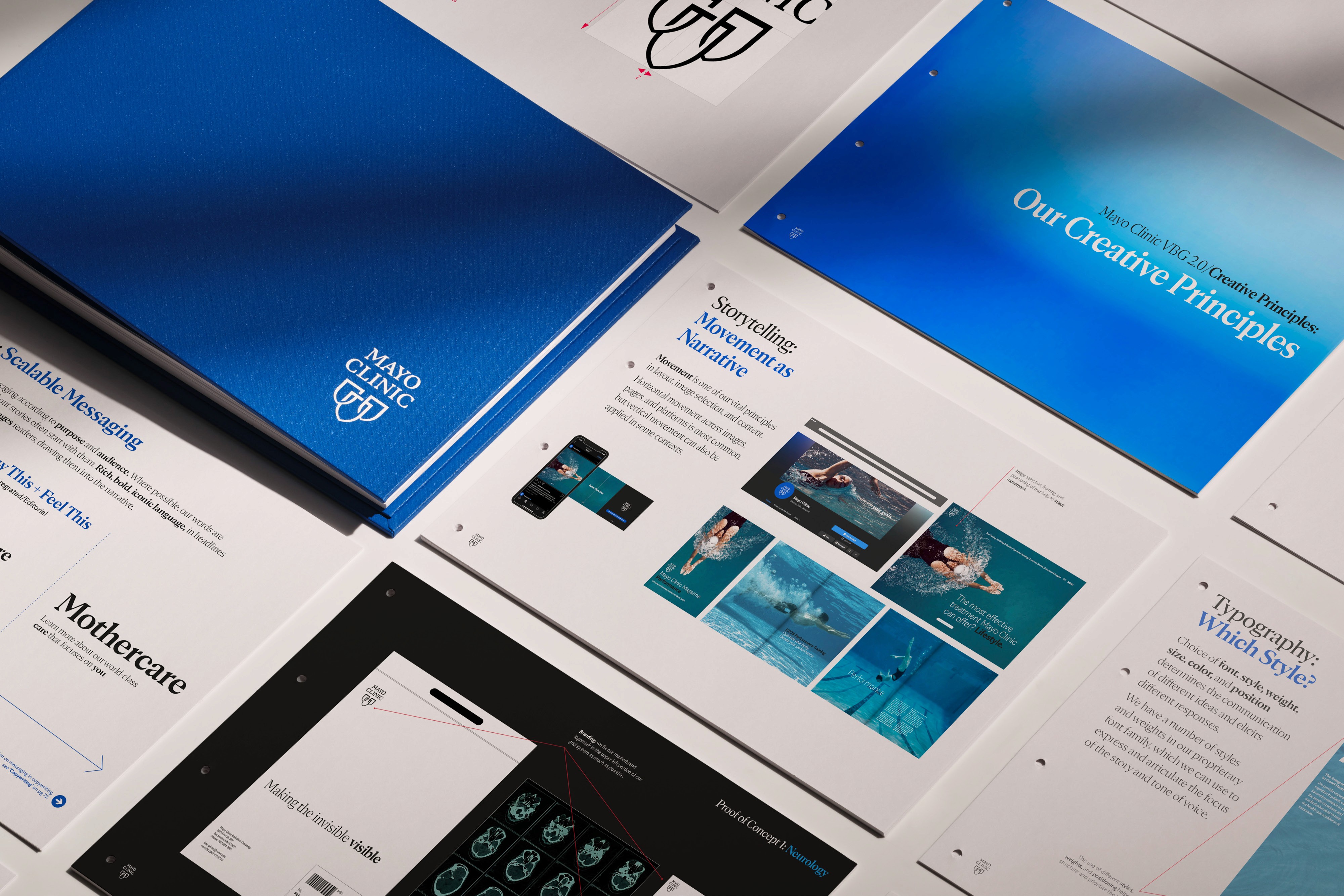 A close-up view of various digital devices and interfaces with blue and black color themes on a tabletop.