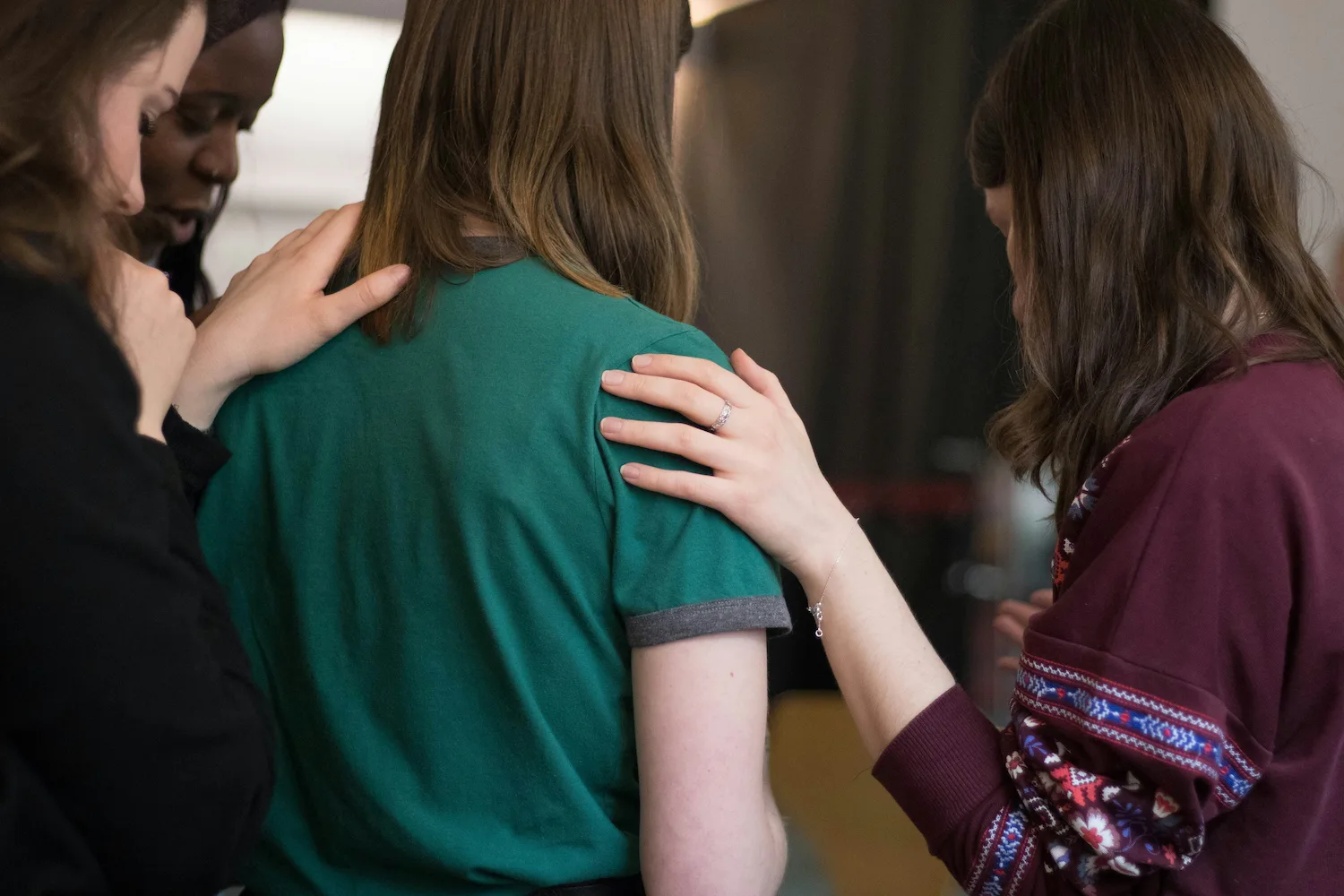 Supportive group therapy session in NYC with members offering comfort and connection, ideal for those seeking social anxiety group therapy, trauma group therapy, or depression group therapy.