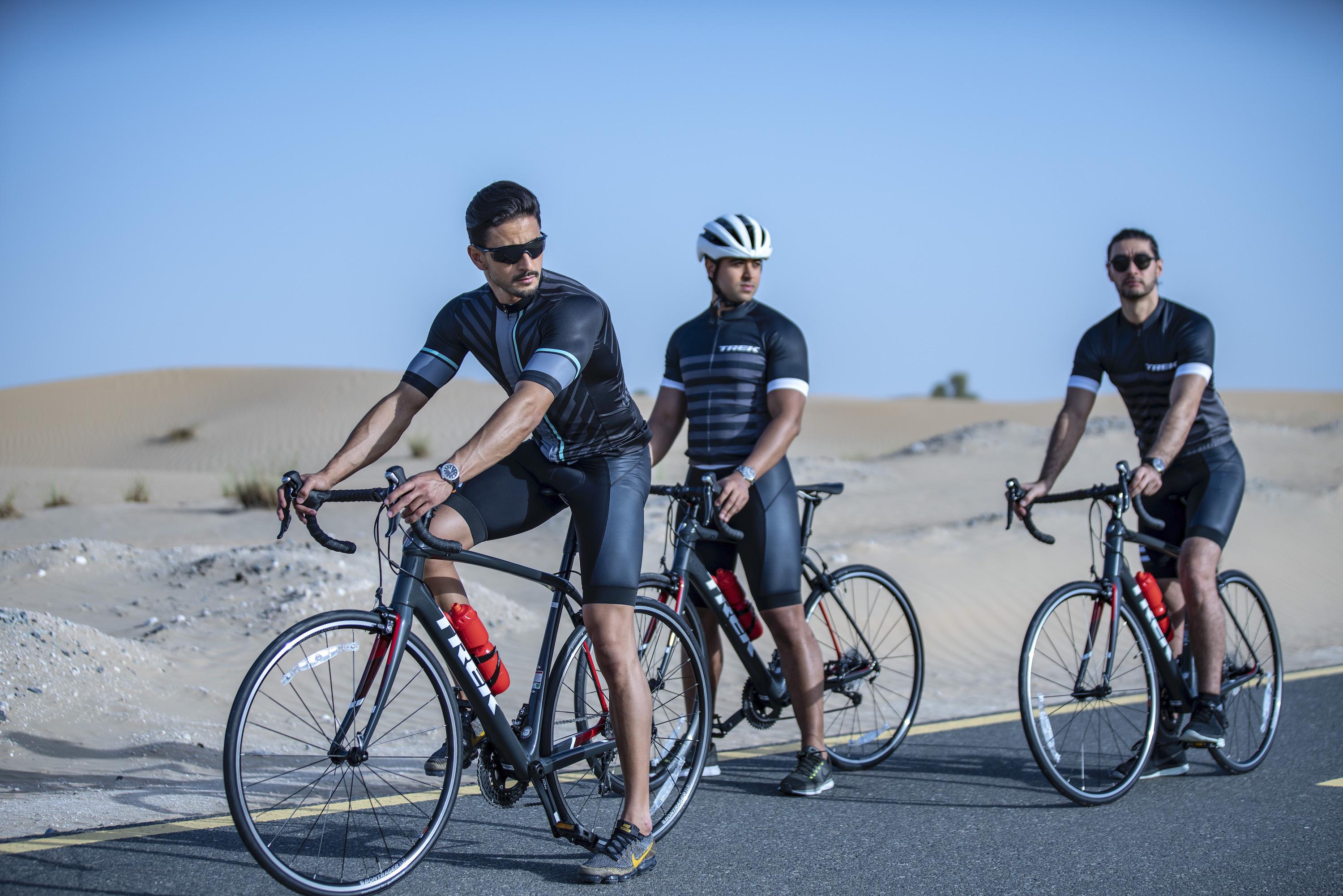 Male models on a bike showcasing Baume & Mercier watch: Baume & Mercier Campaign Photoshoot | Relity Group
