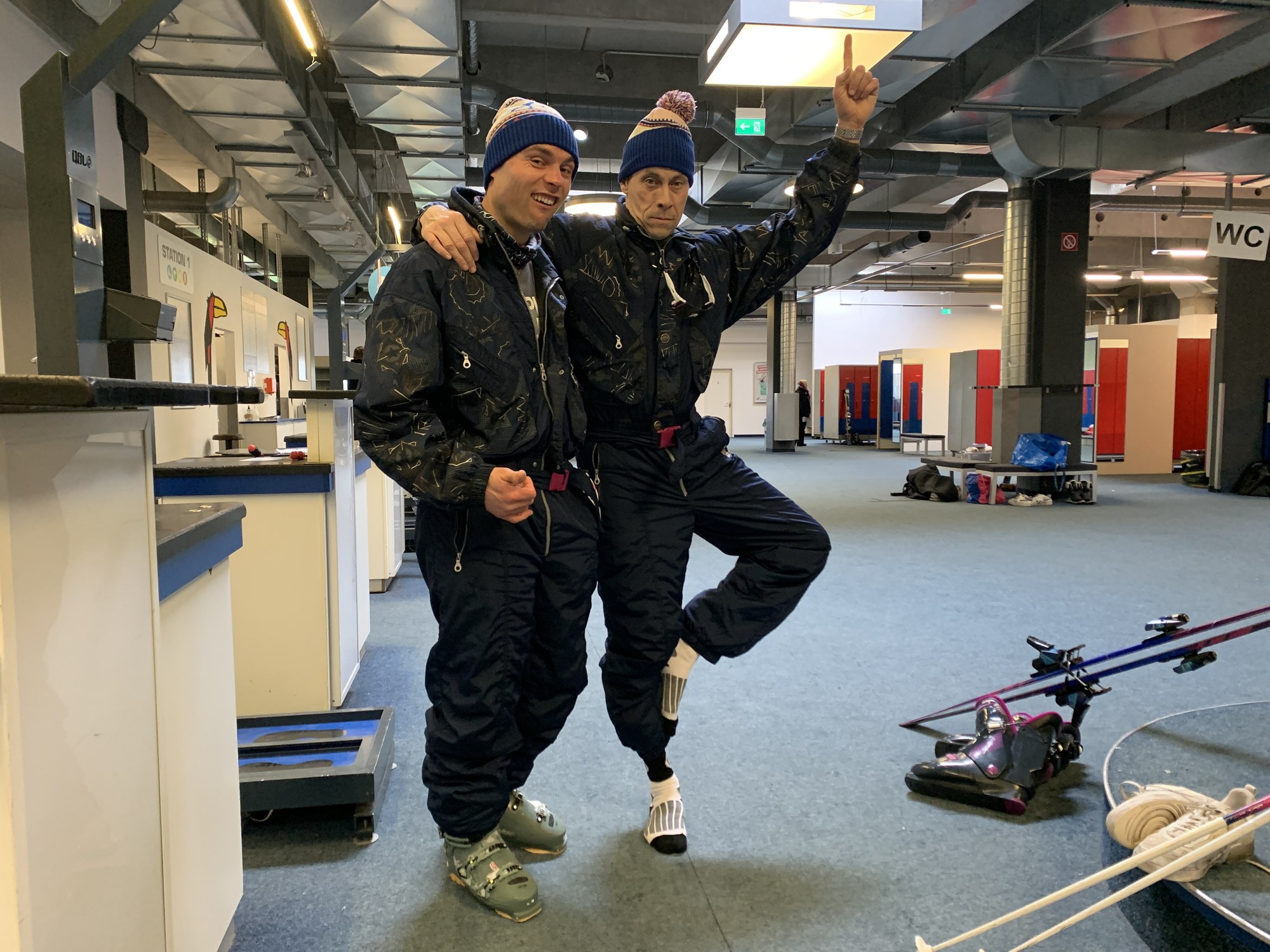 Tobi Deckert and a colleague in retro onesies on set at the alpincenter Wittenburg
