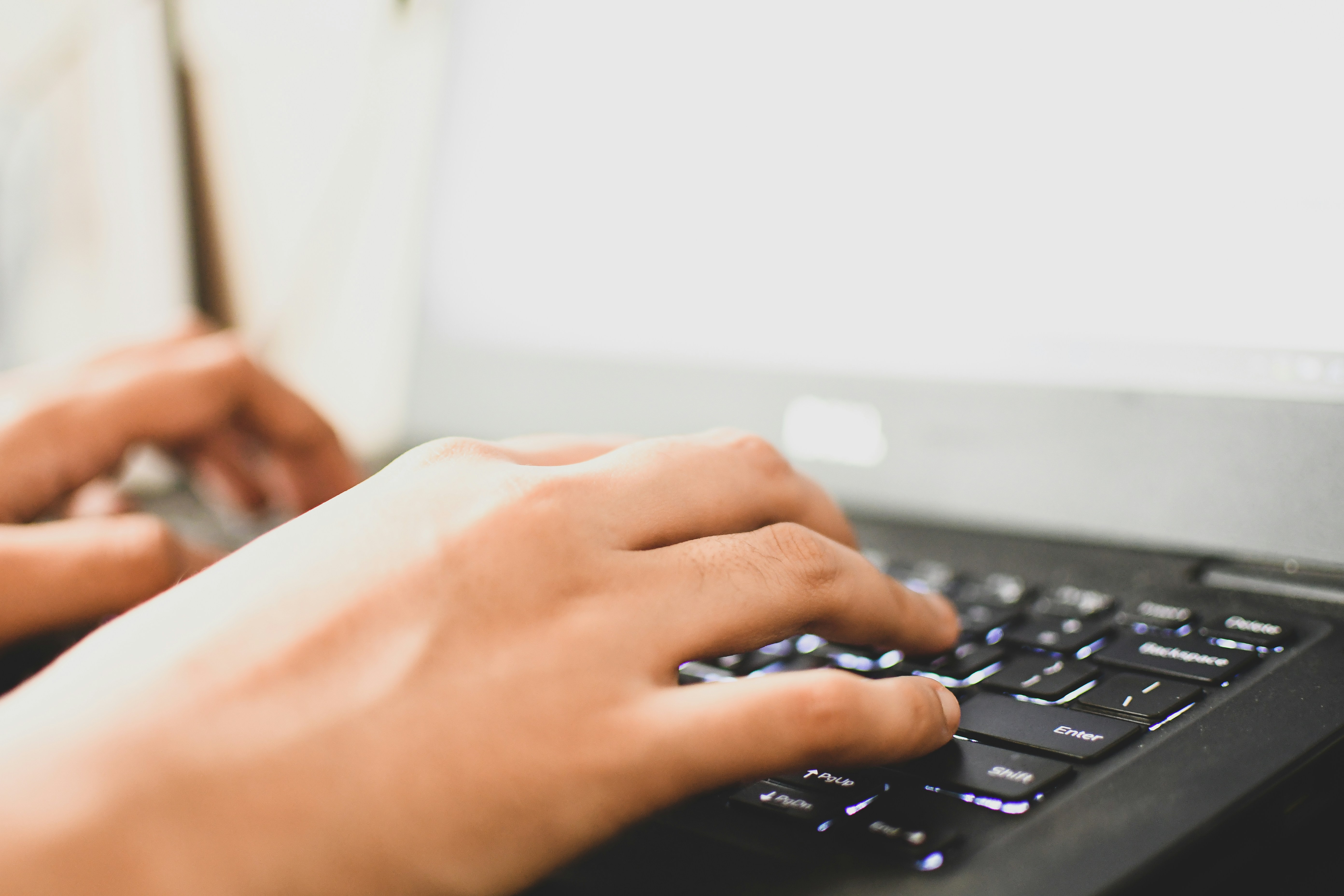 woman researching about Controversial Research Paper Topics