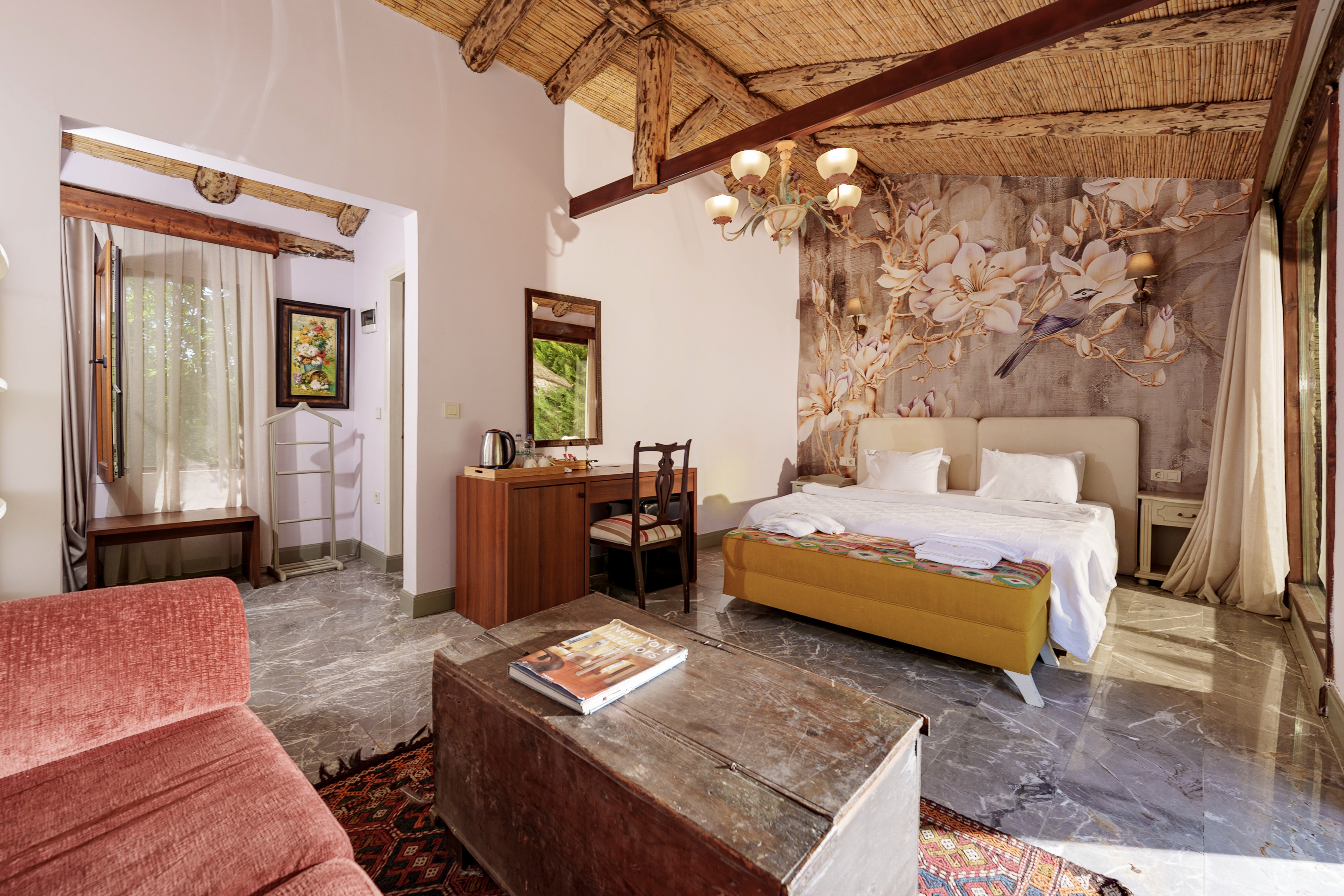 A luxurious penthouse suite in a coastal boutique hotel.