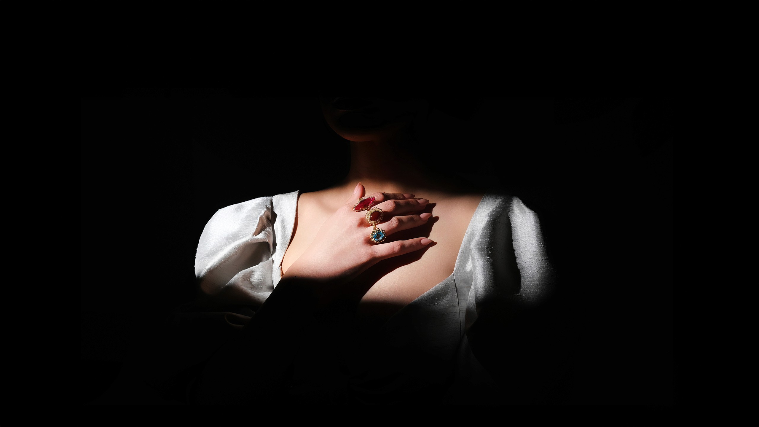 Fashion photoshoot with a woman posing in a dress