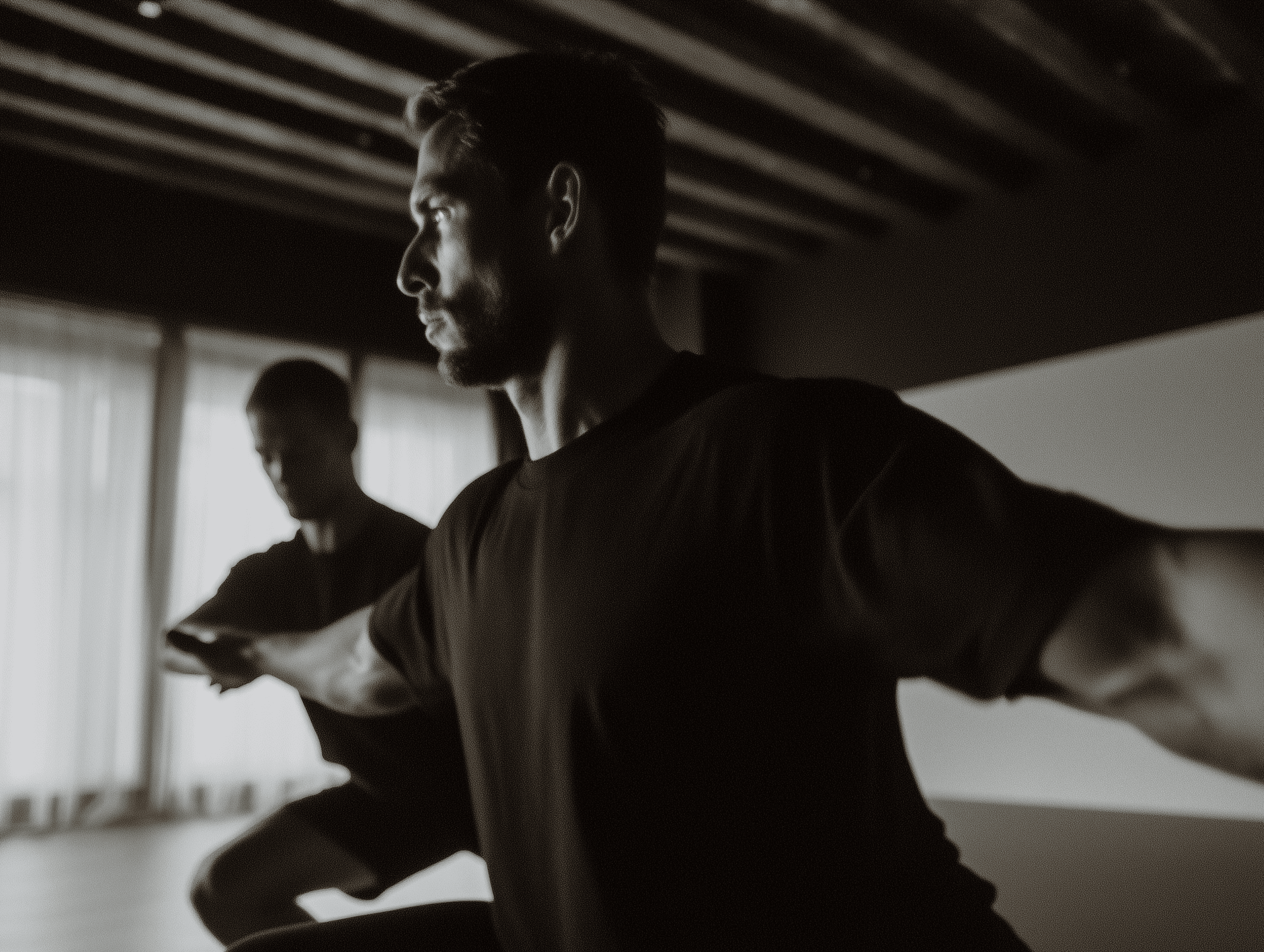 Person doing a lunge stretch on a yoga mat.