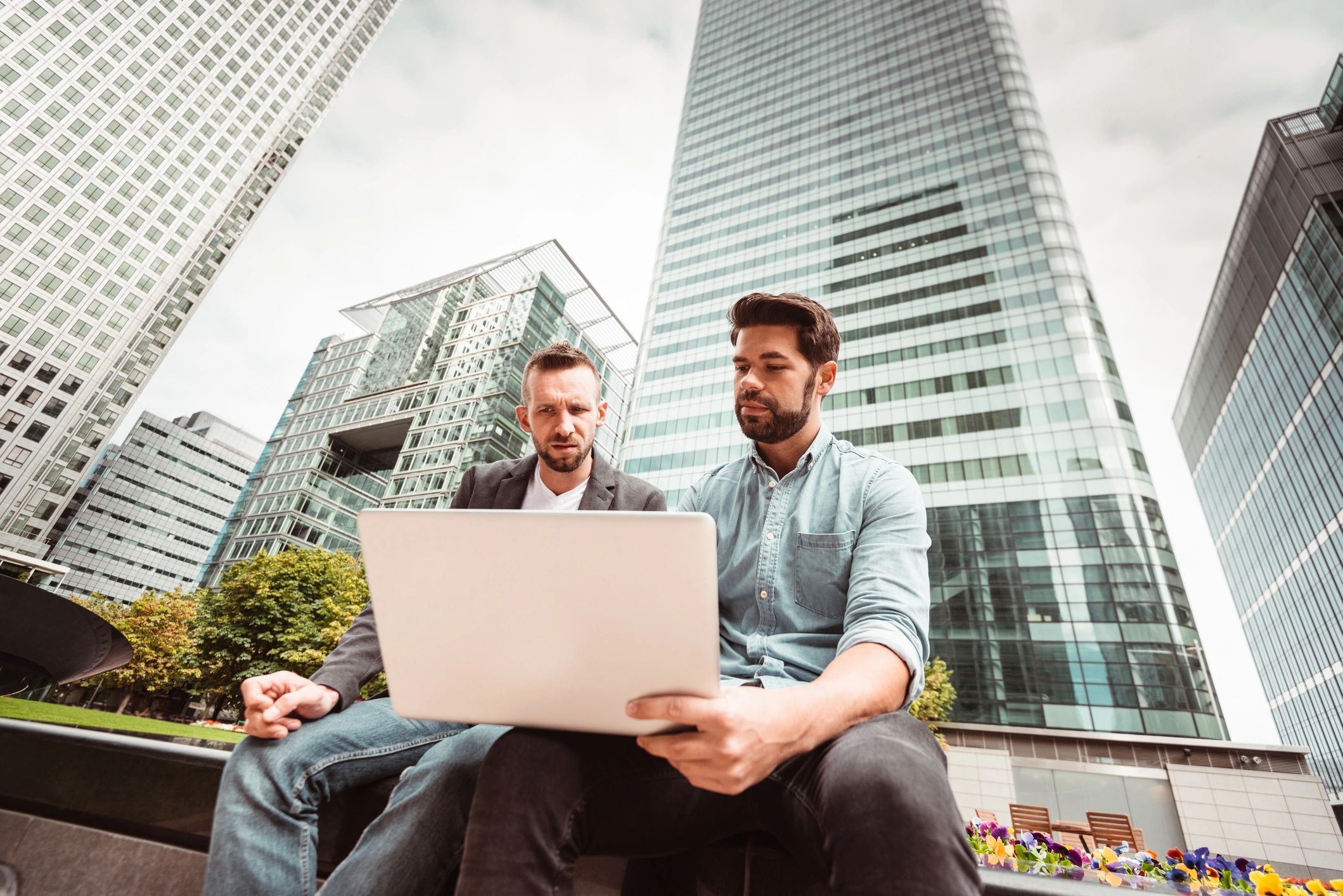 a black and white living room with a large tv