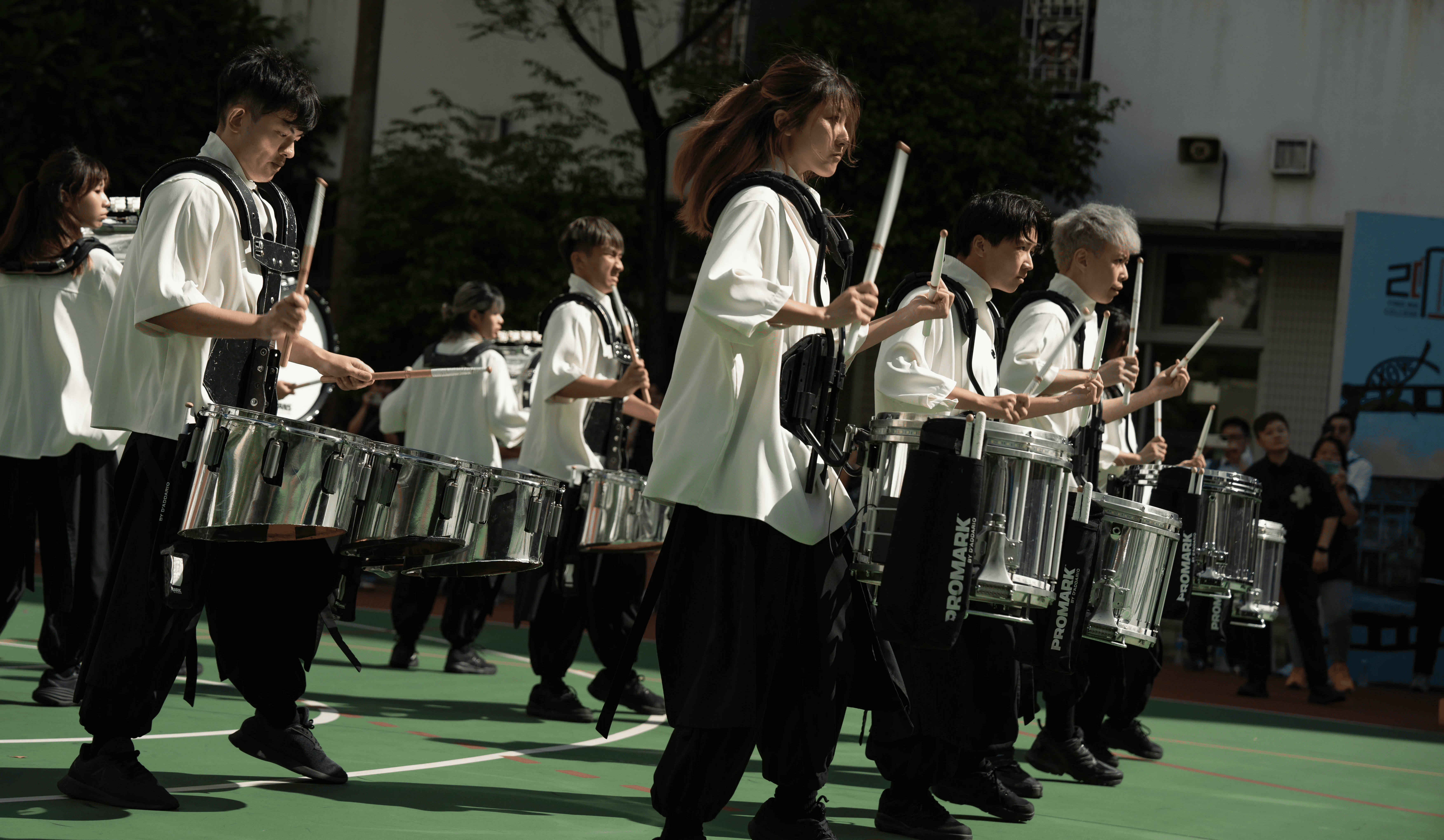 The Peagasus Vanguard Drumline from Hong Kong is battling with other team under the burning sun