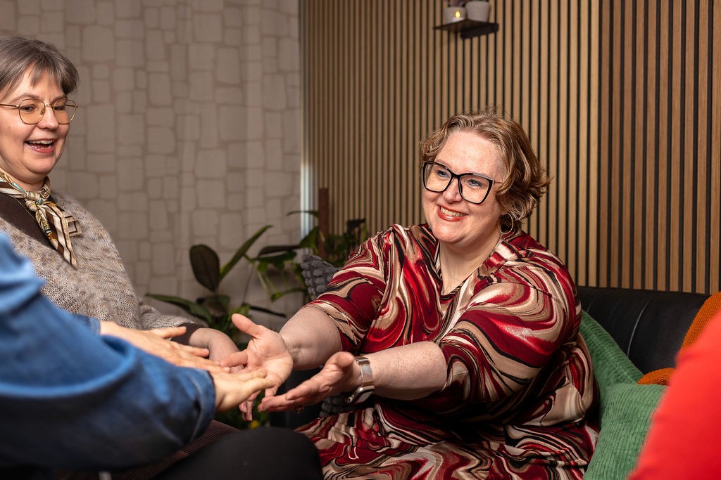 Female yoga instructor teaching a client