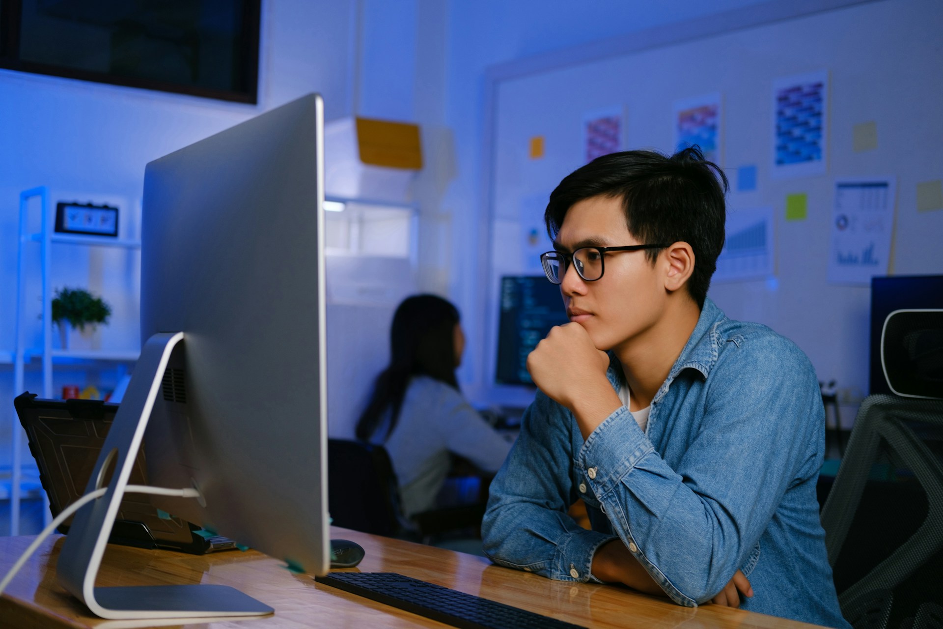 man working on computer for software development