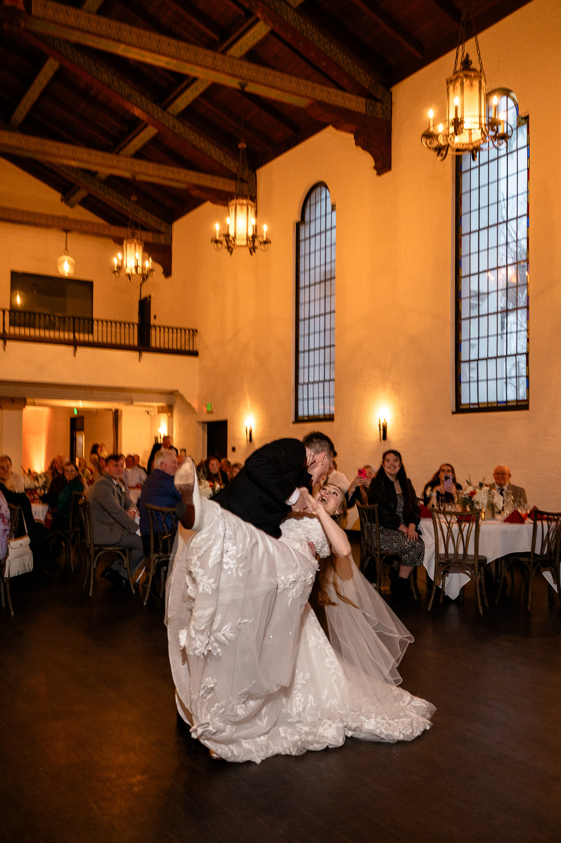 Flat lay wedding details with bouquet, rings, and sparkling bridal heels
