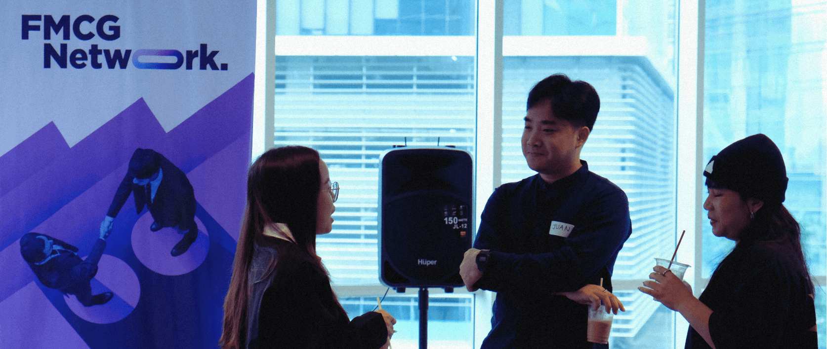 a woman sitting on a roof talking on a cell phone
