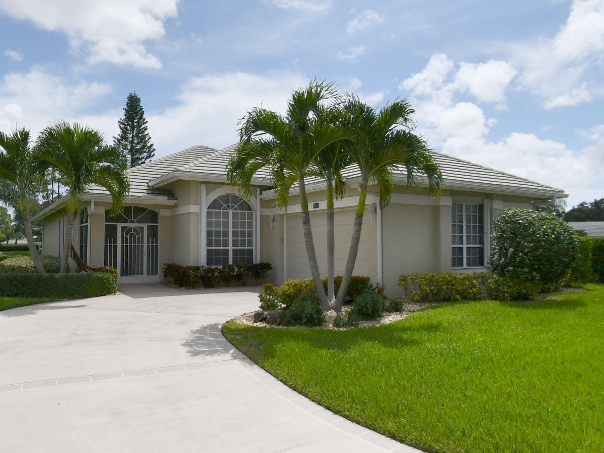 2005 Roof Replacement in Marsh Landing, PGA Village, Port St Lucie with Entegra Flat Broom Swept Tile in Natural Gray