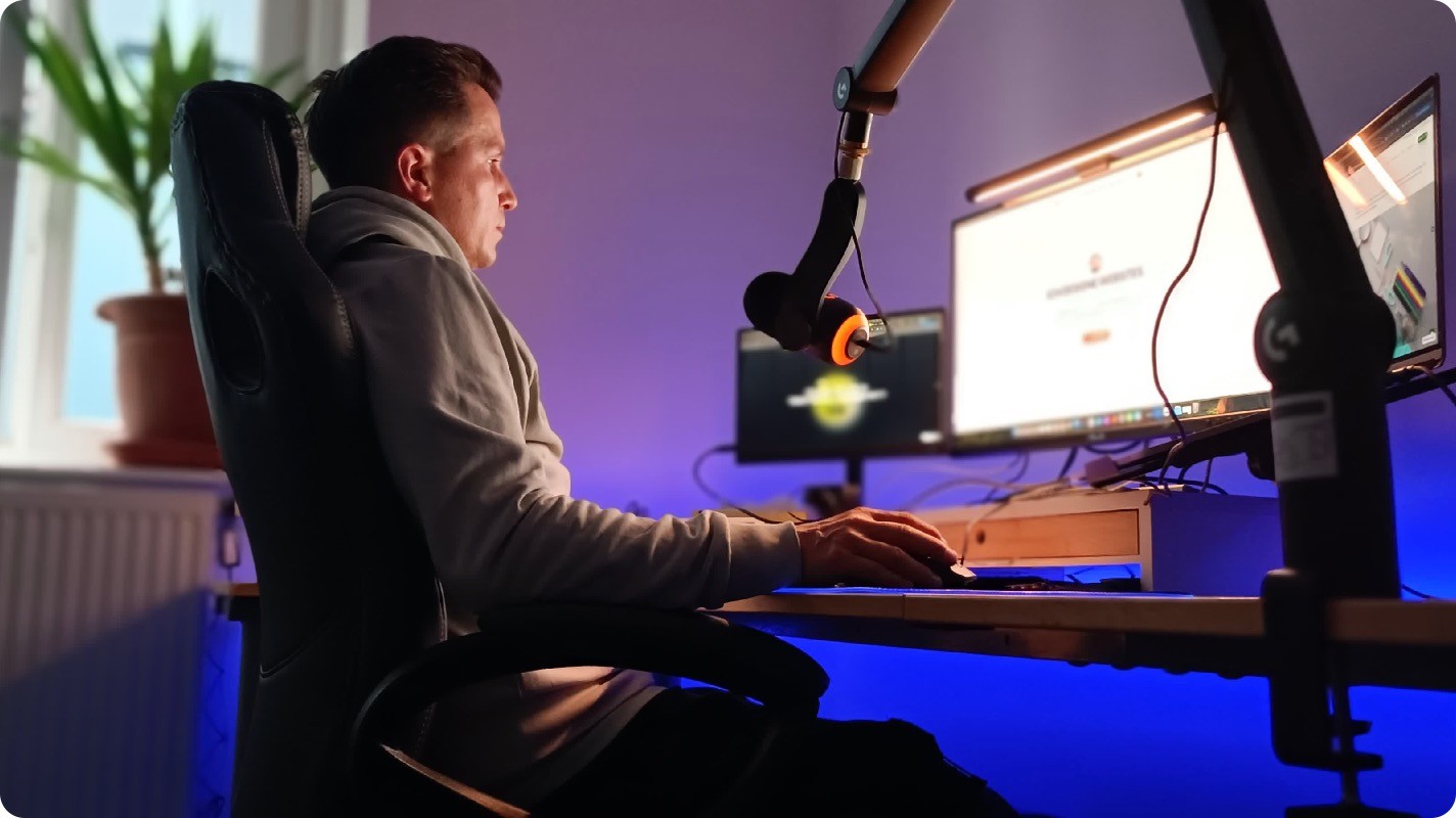 Apple MacBook beside computer mouse on table