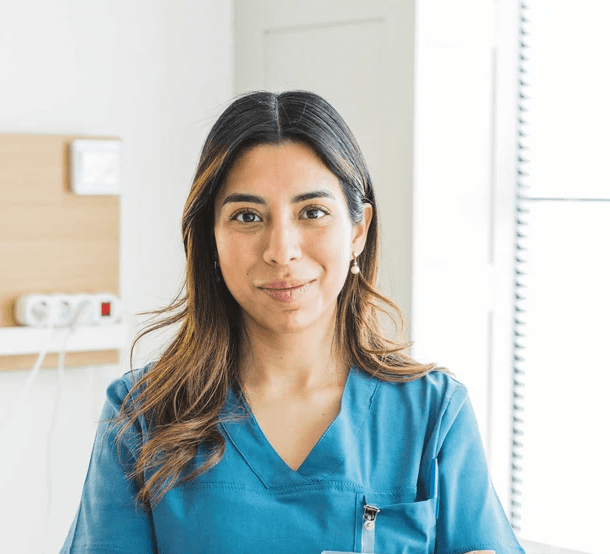 an older woman with white hair and a smile