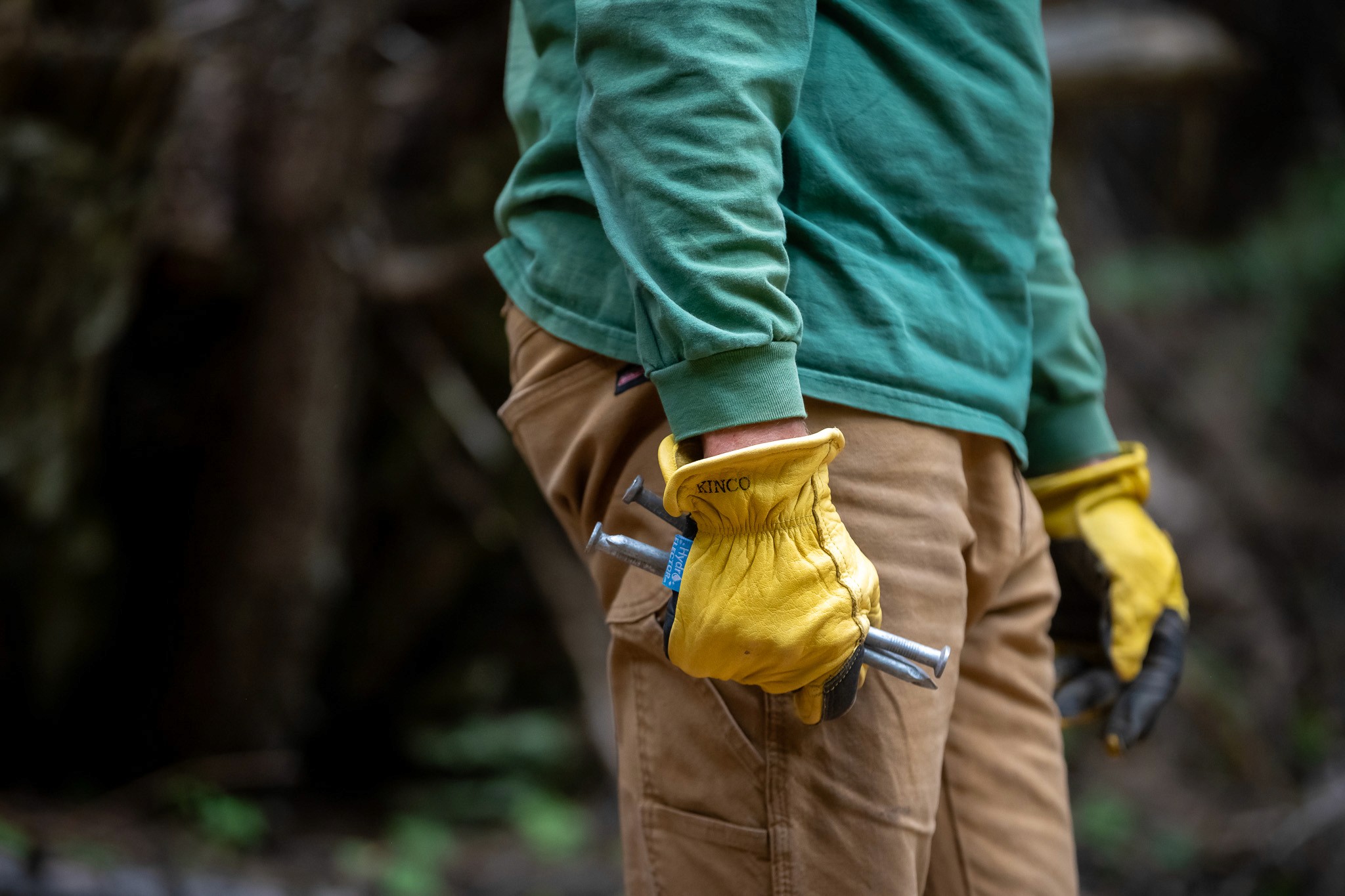 A FoTJC board member helping to build a puncheon walkway on the Tilly Jane Trailhead
