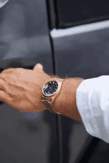 person holding black dslr camera