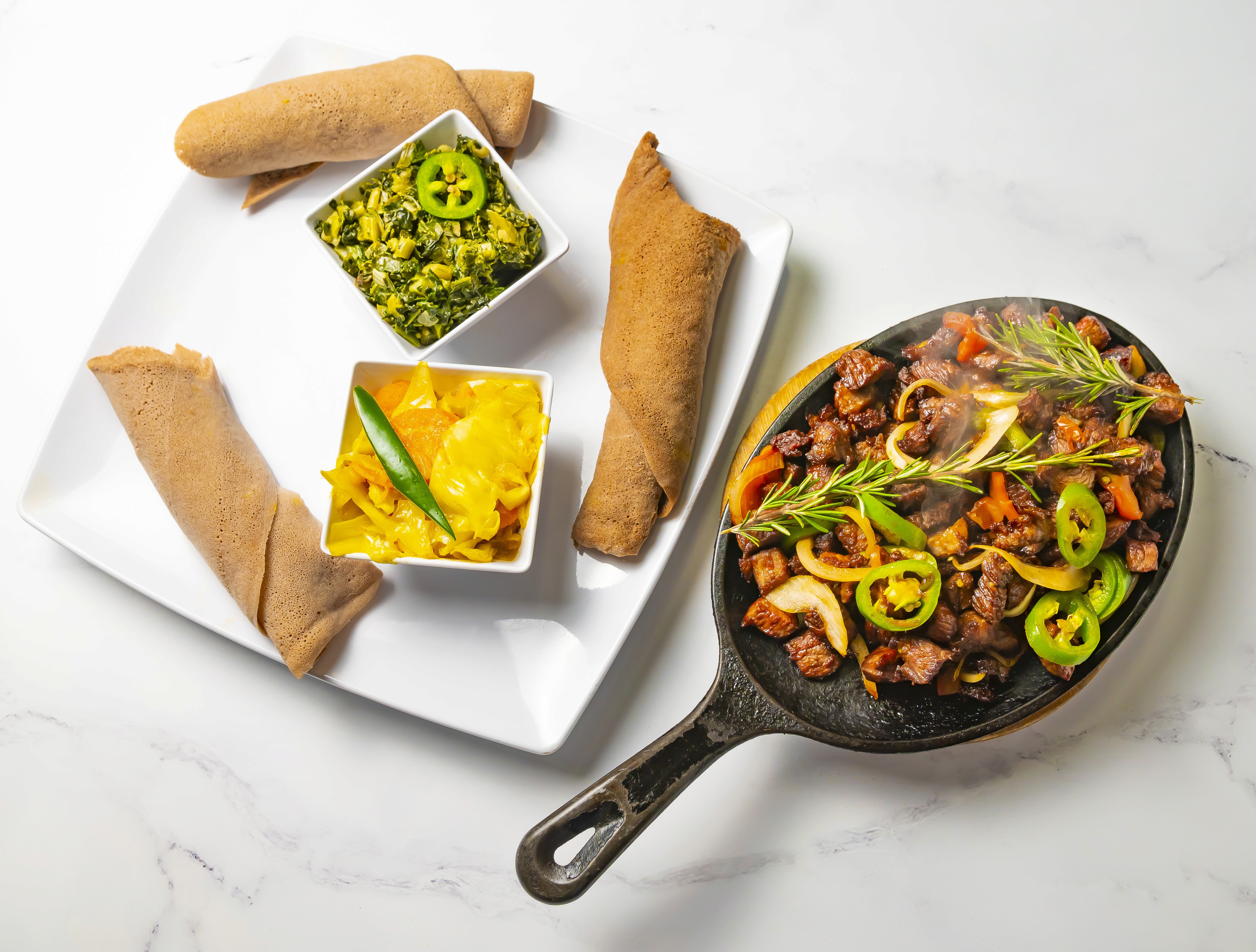 Plated Ethiopian dishes photographed for Katar River Restaurant