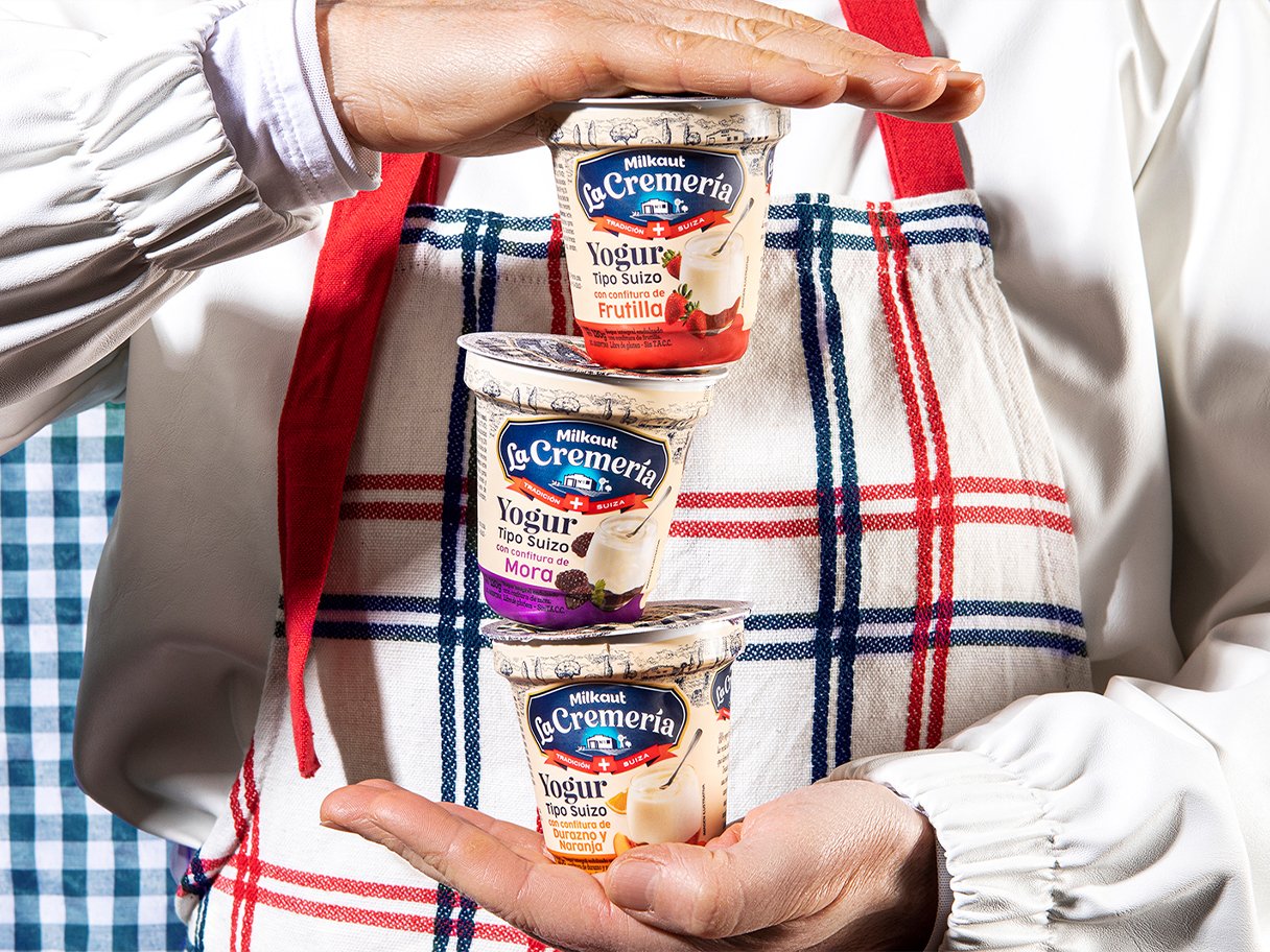 Rooftops of a coastal town with the sea in background
