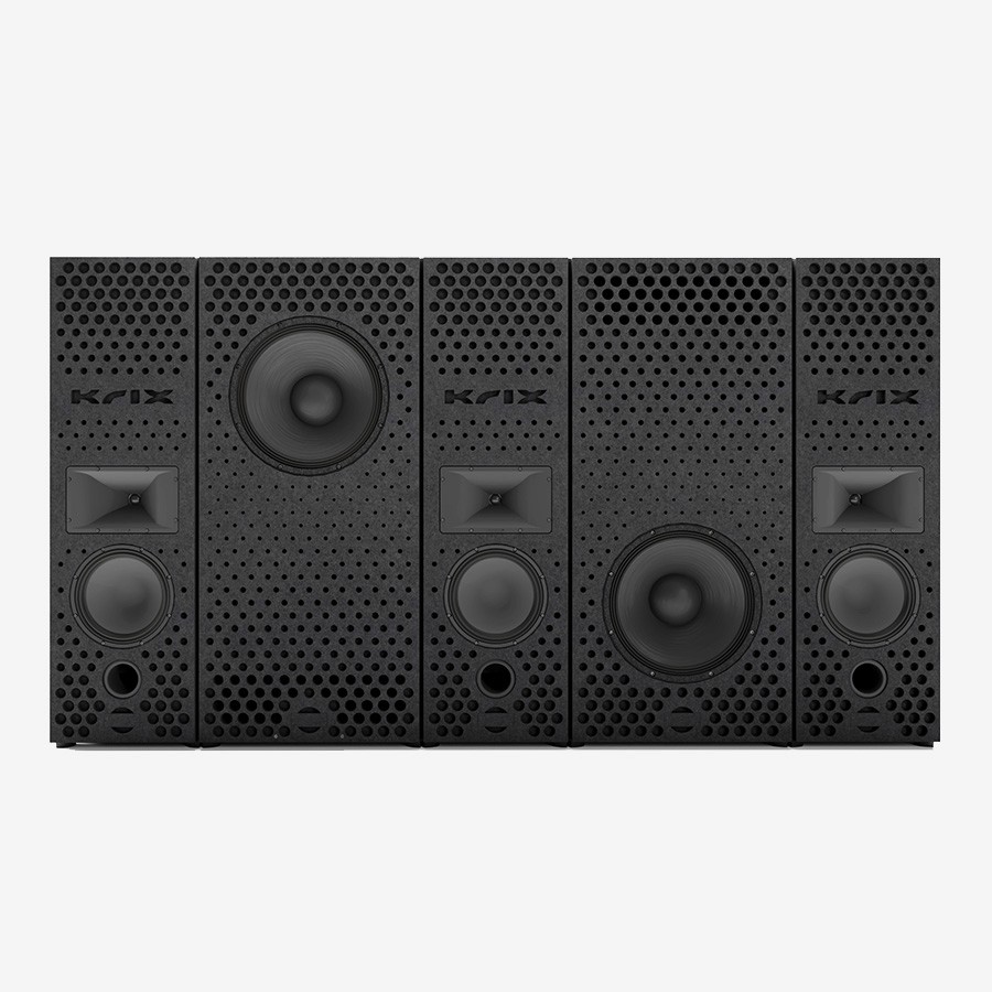 Four black KRIX speakers arranged in a row.