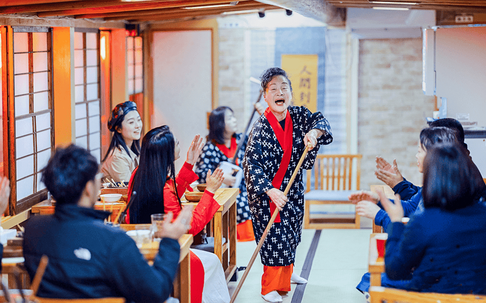 Traditional Japanese dance performance on a boat in Japan.