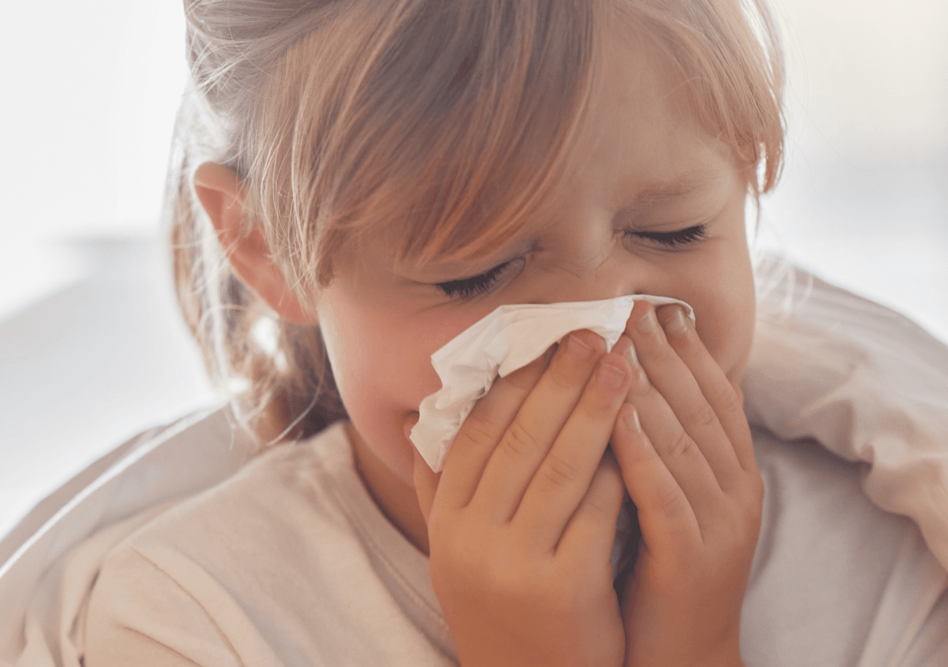 girl sneezing