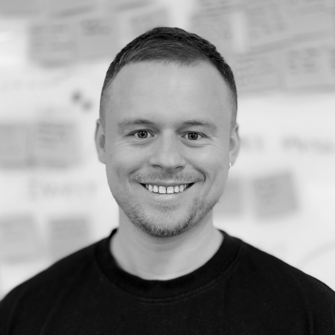 Headshot of Jay Clark, Senior Design Manager at Monzo