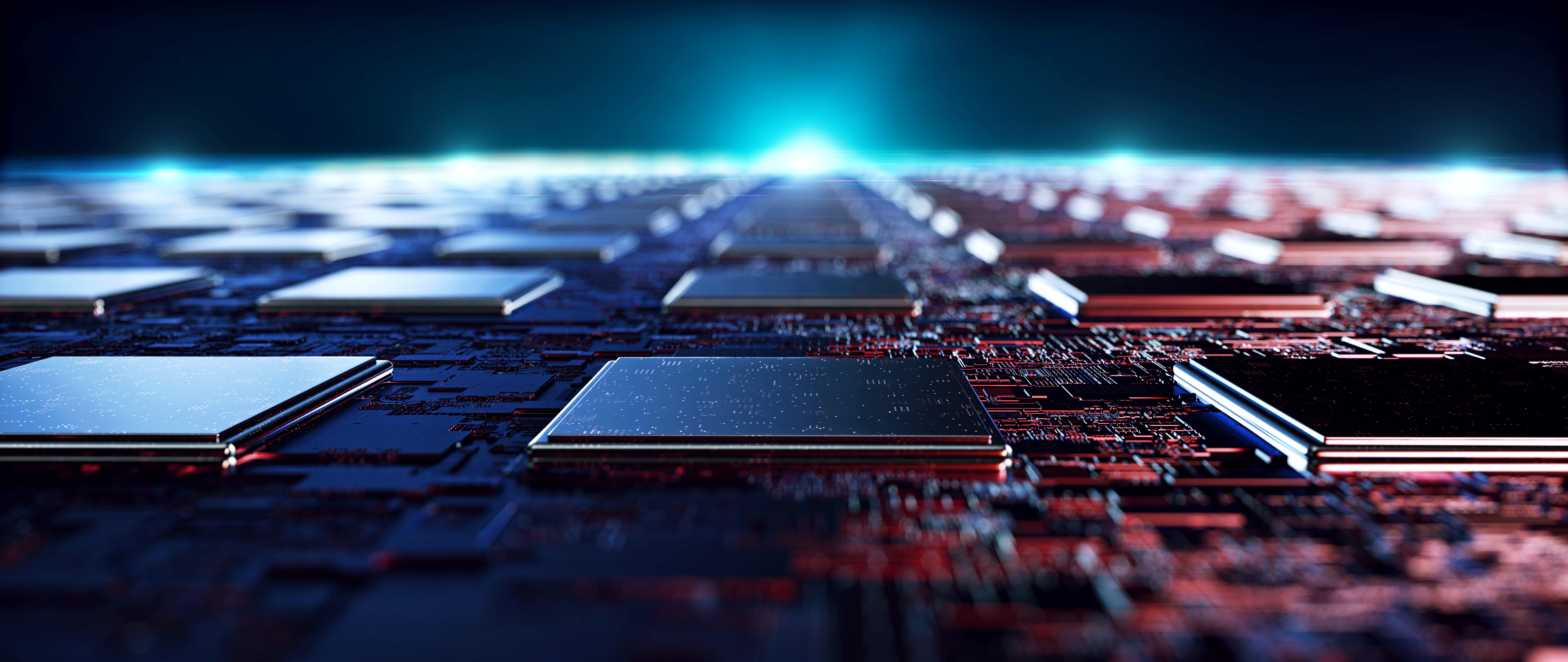 3D render of rows of silicon chips on a dark circuit board with blue and red glowing light