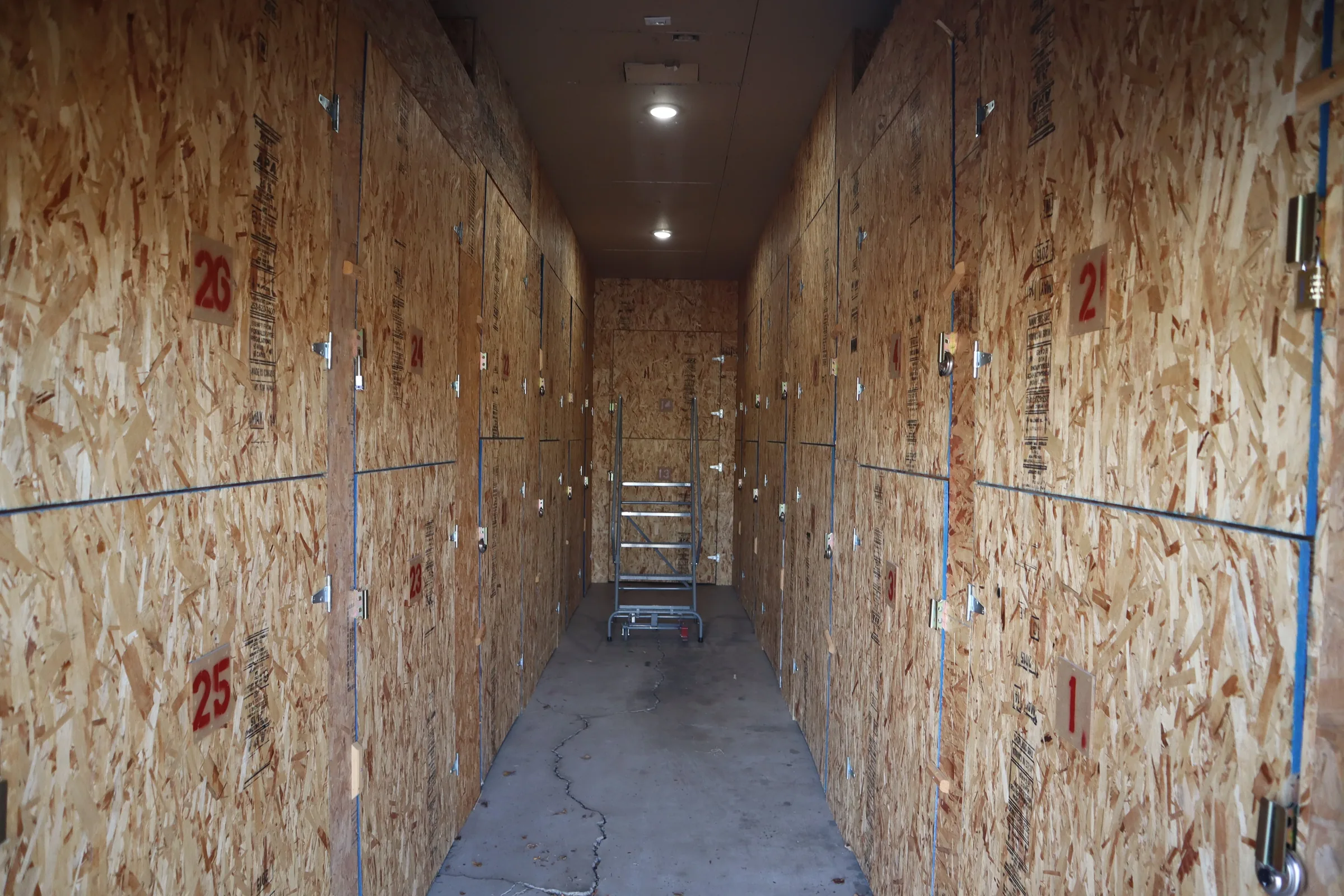 Interior of a long wood-paneled storage unit