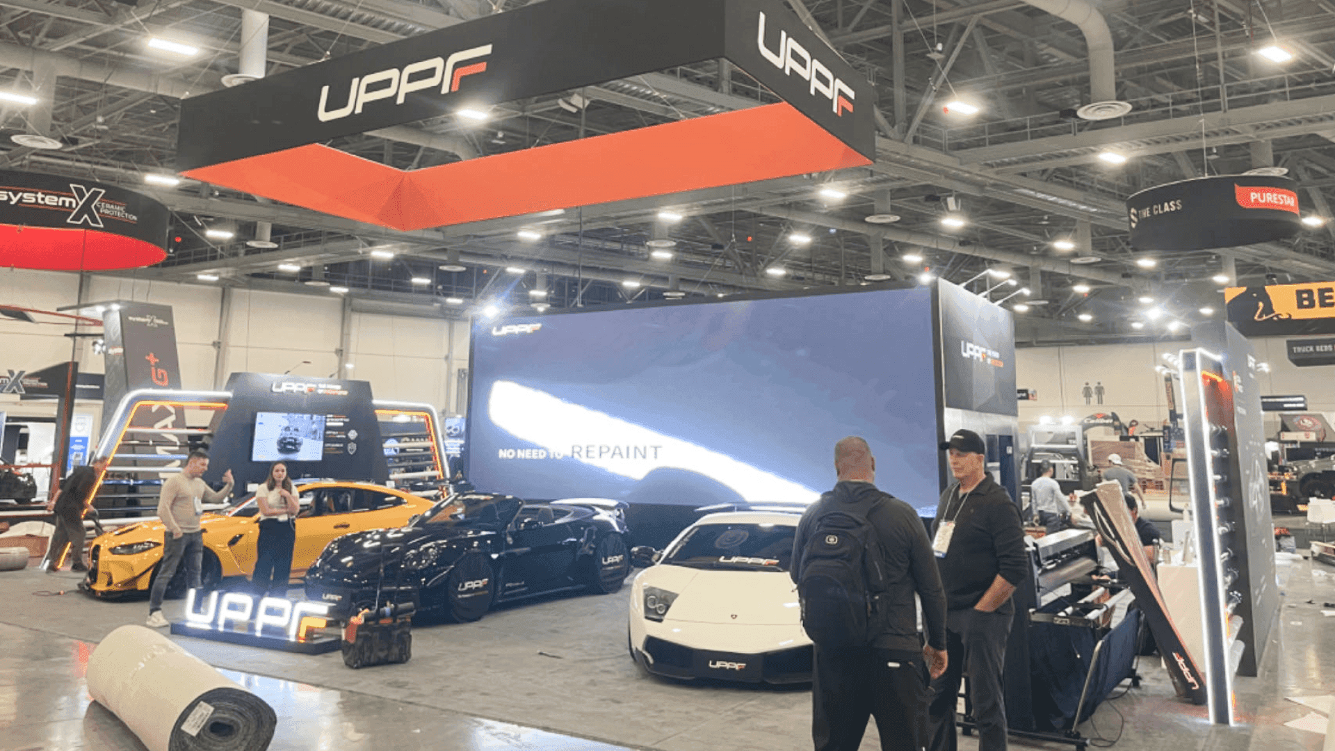 20x20 fleet technology booth at Las Vegas Convention Center prepared with demo screens and fleet meeting area